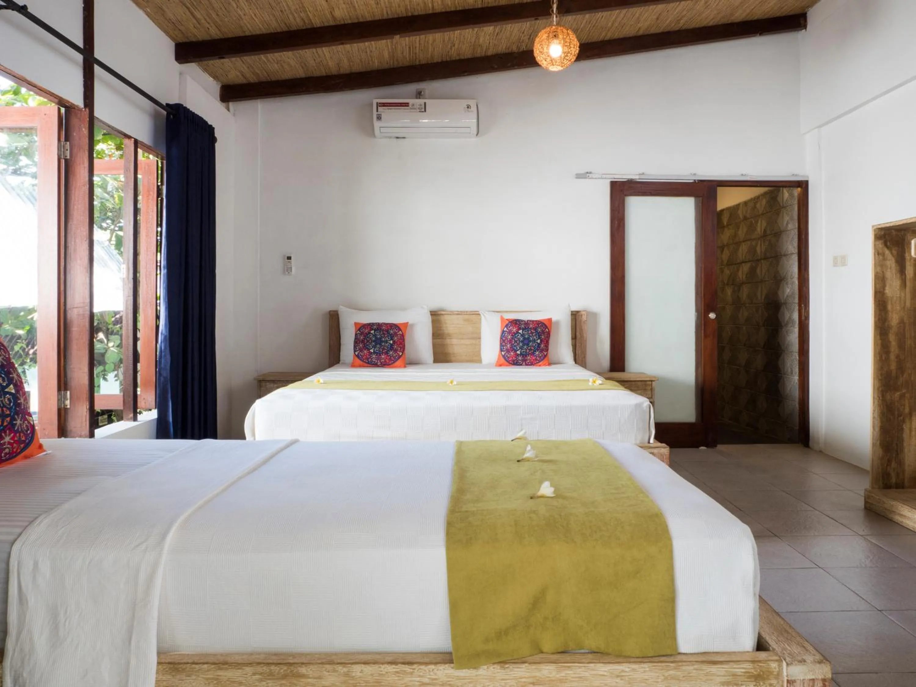 Bed in Gili Turtle Beach Resort