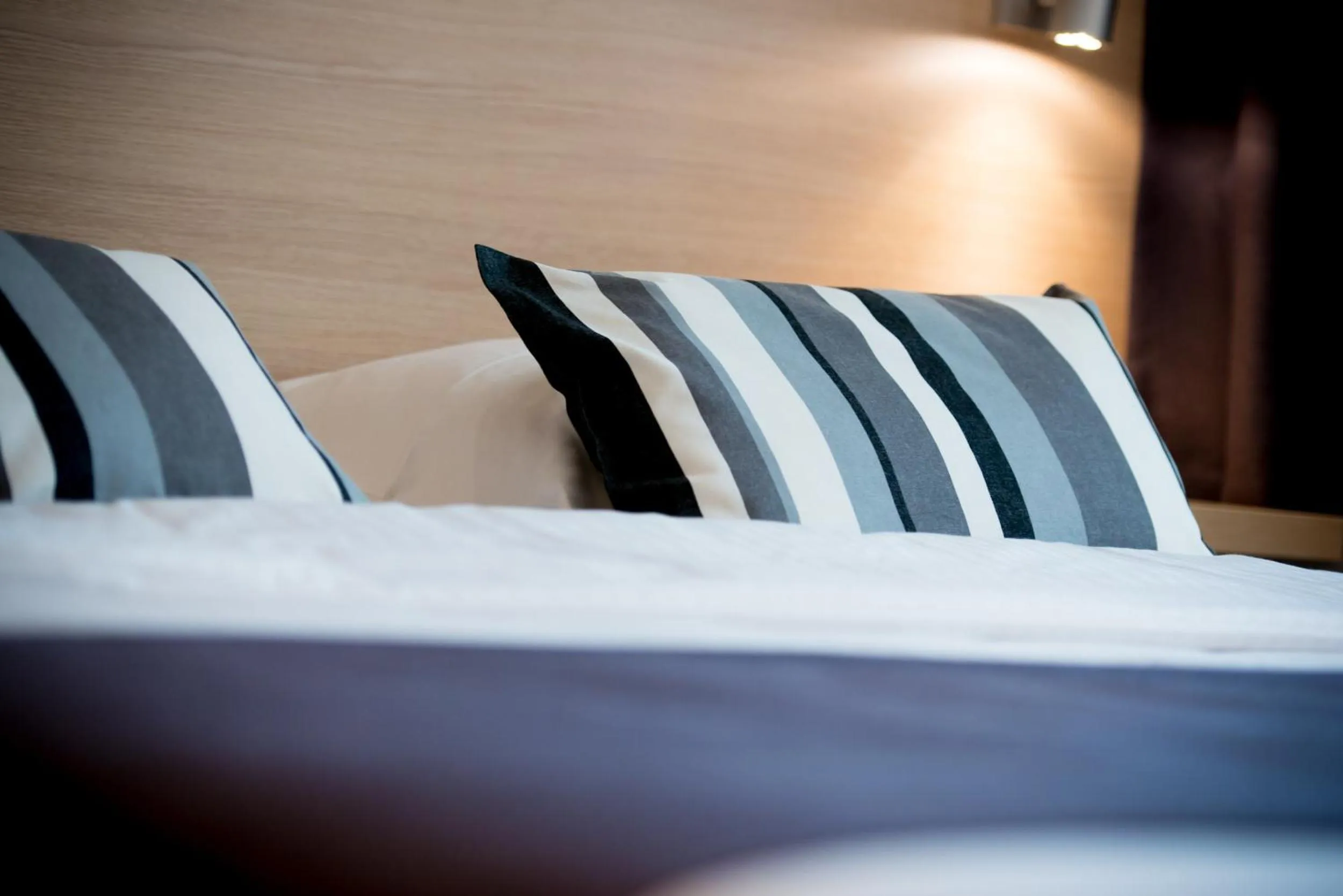 Bed in Hôtel de l'Univers Liège