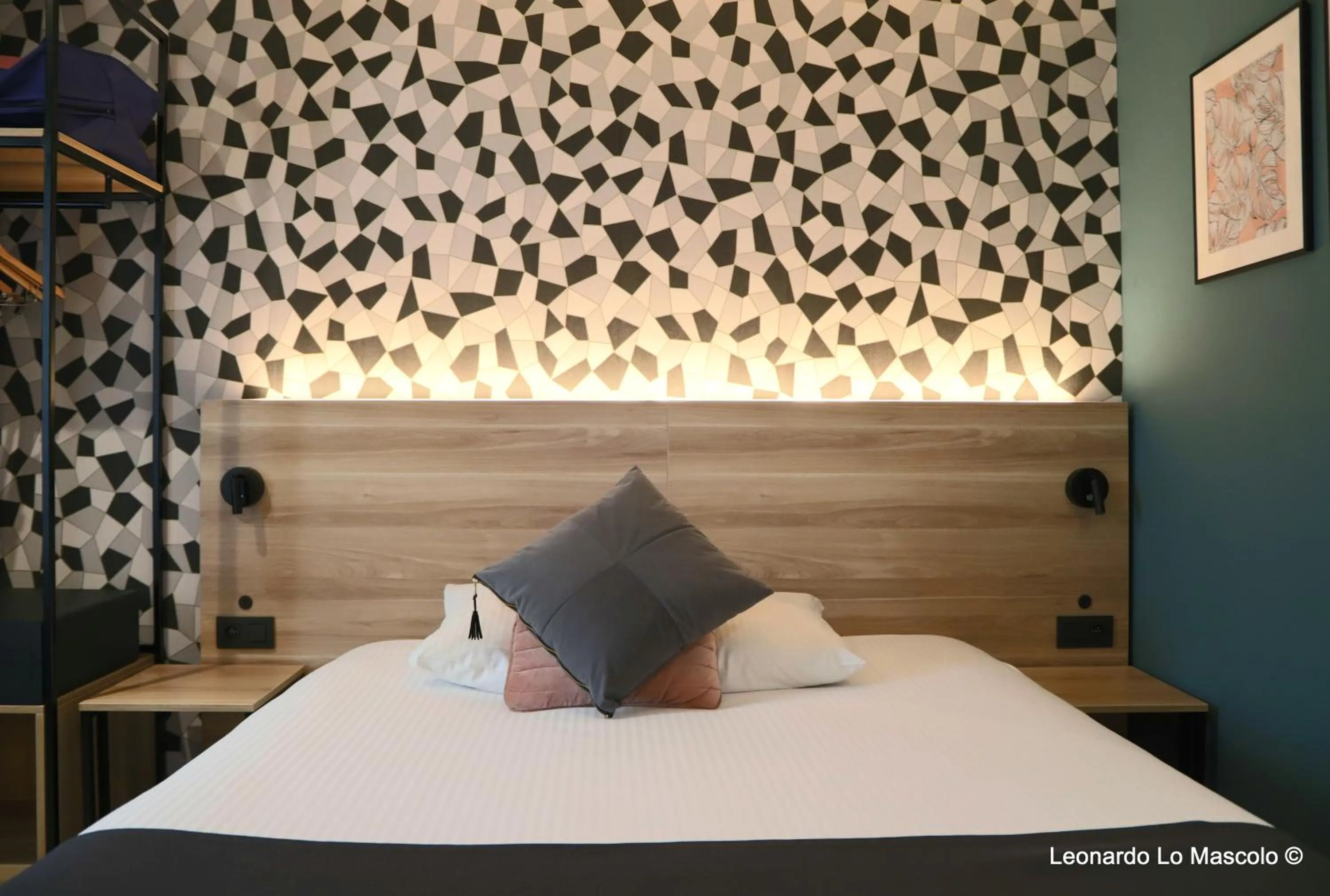 Bed in Hôtel de l'Univers Liège