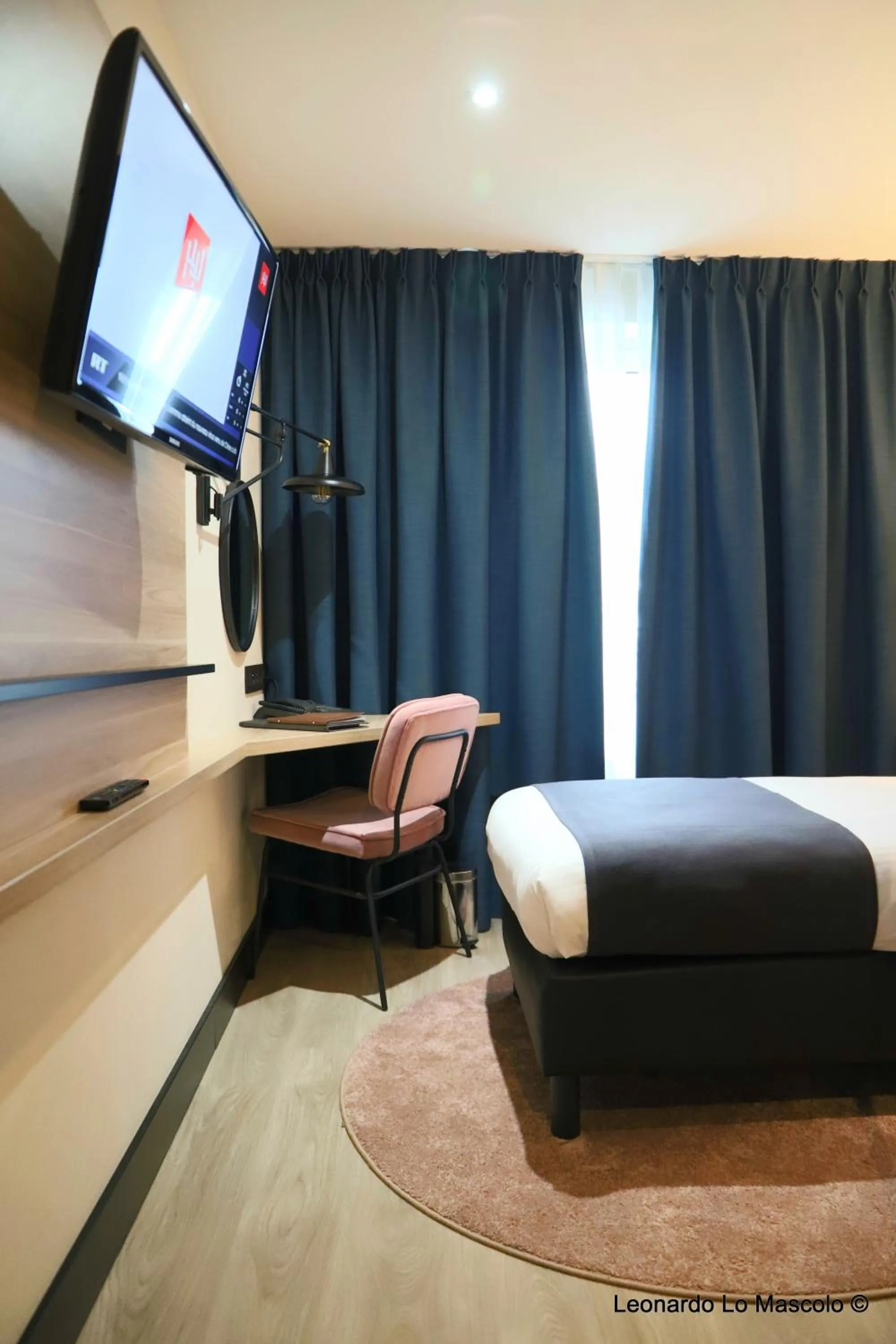 Bed in Hôtel de l'Univers Liège