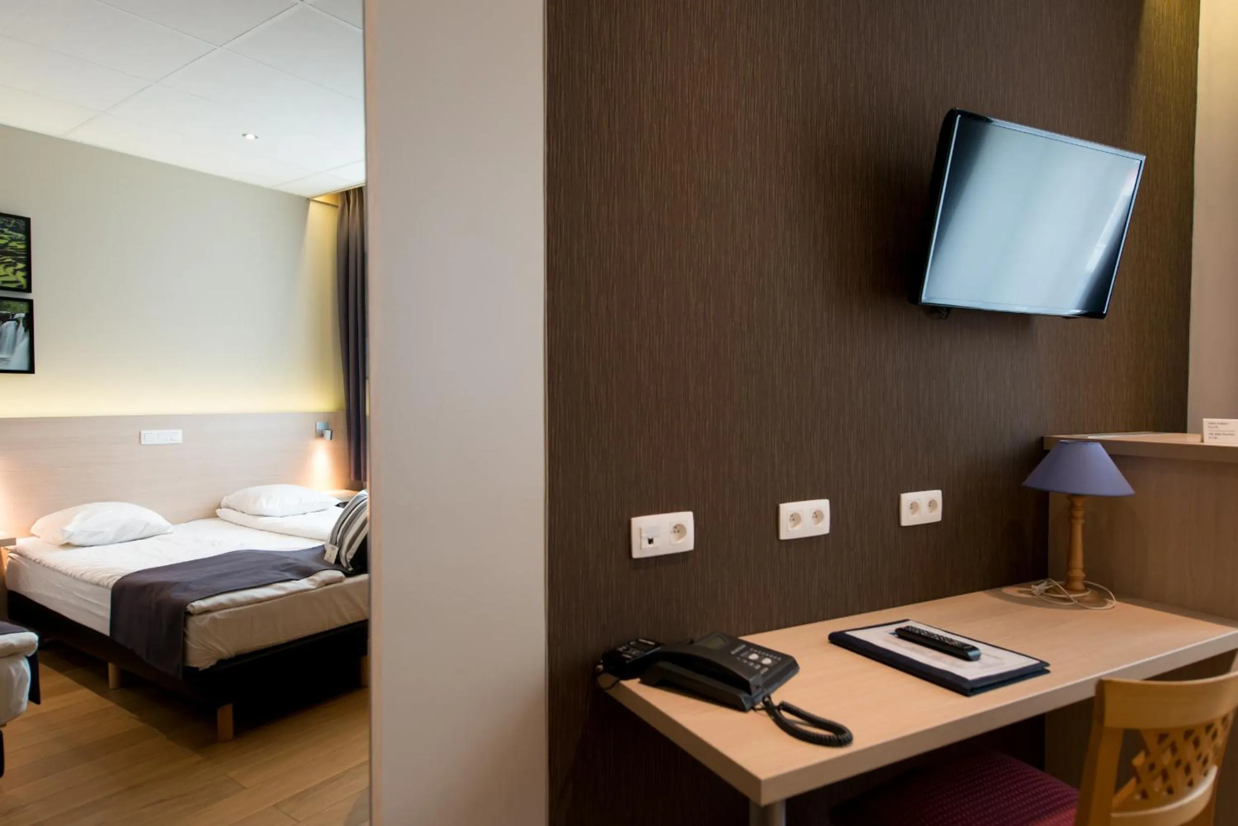 Seating area, Bed in Hôtel de l'Univers Liège