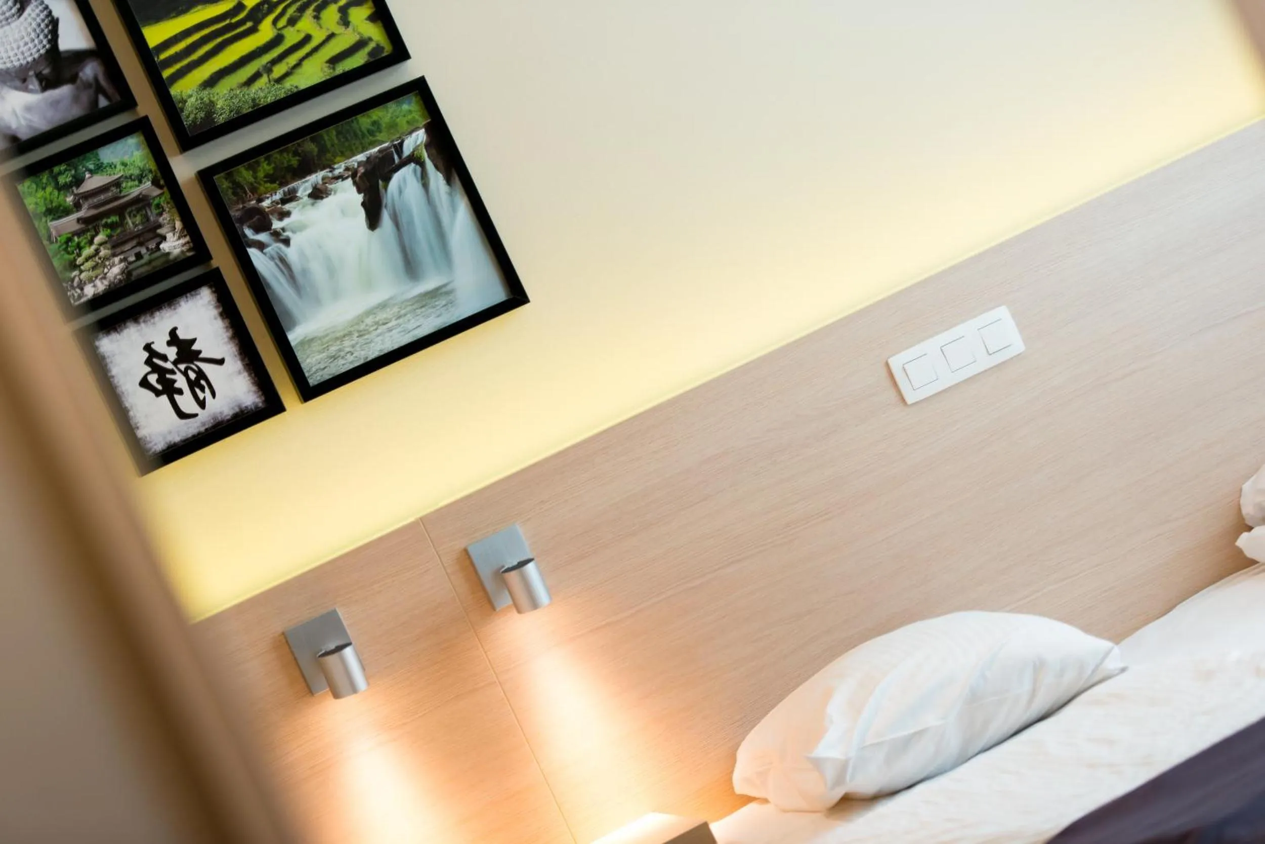 Bed in Hôtel de l'Univers Liège