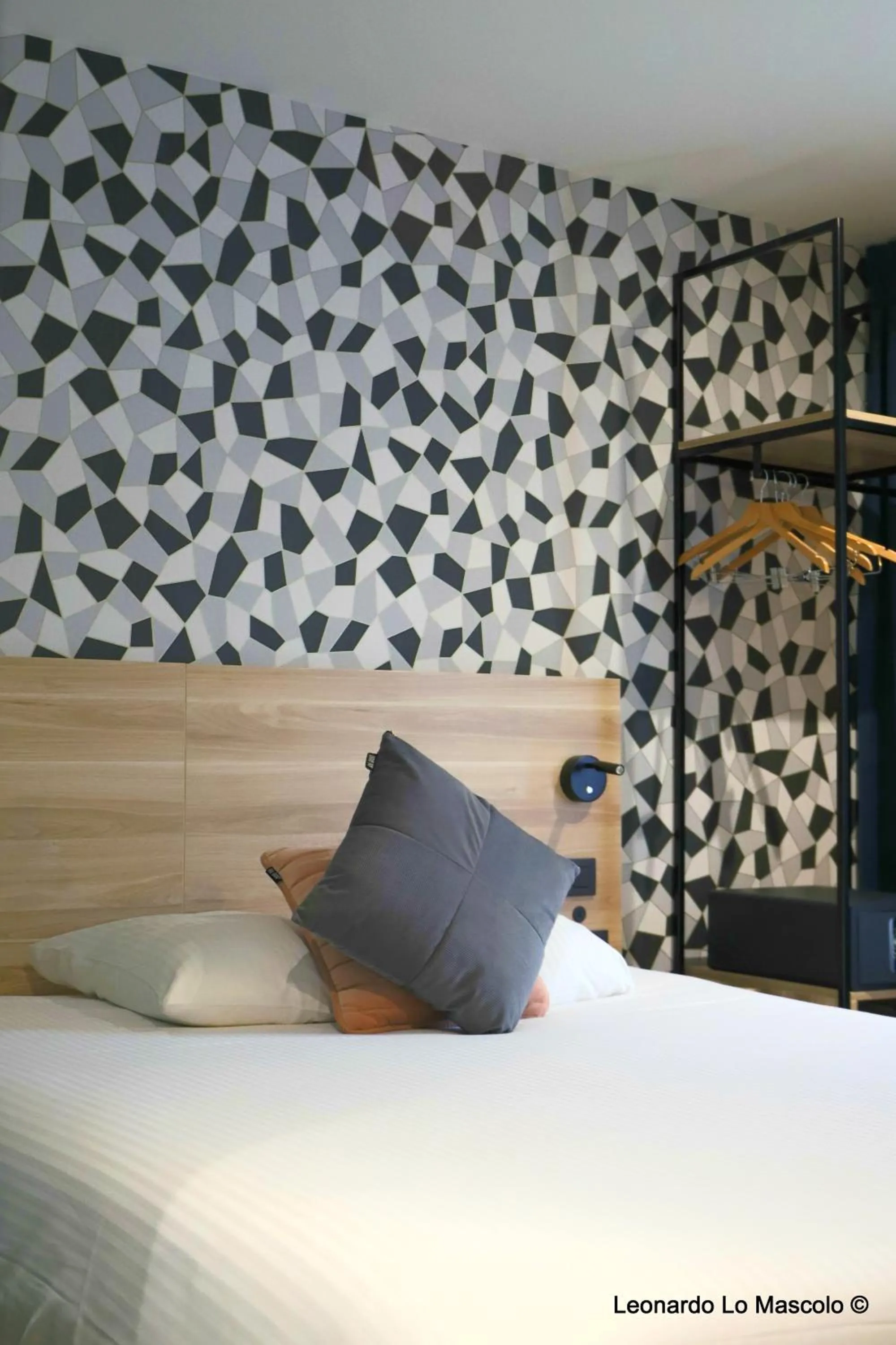 Bed in Hôtel de l'Univers Liège