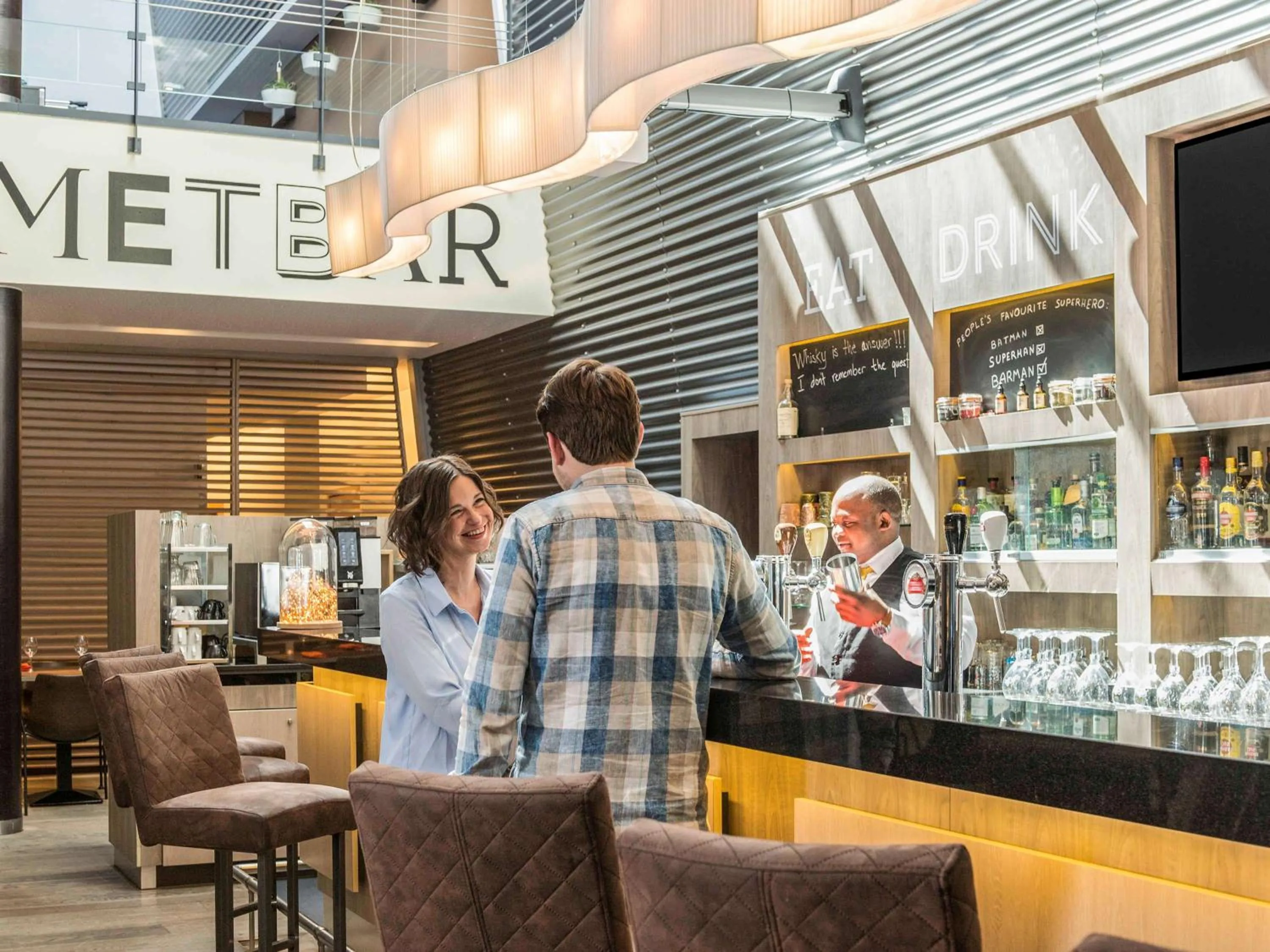 Lounge or bar in Novotel Mechelen Centrum