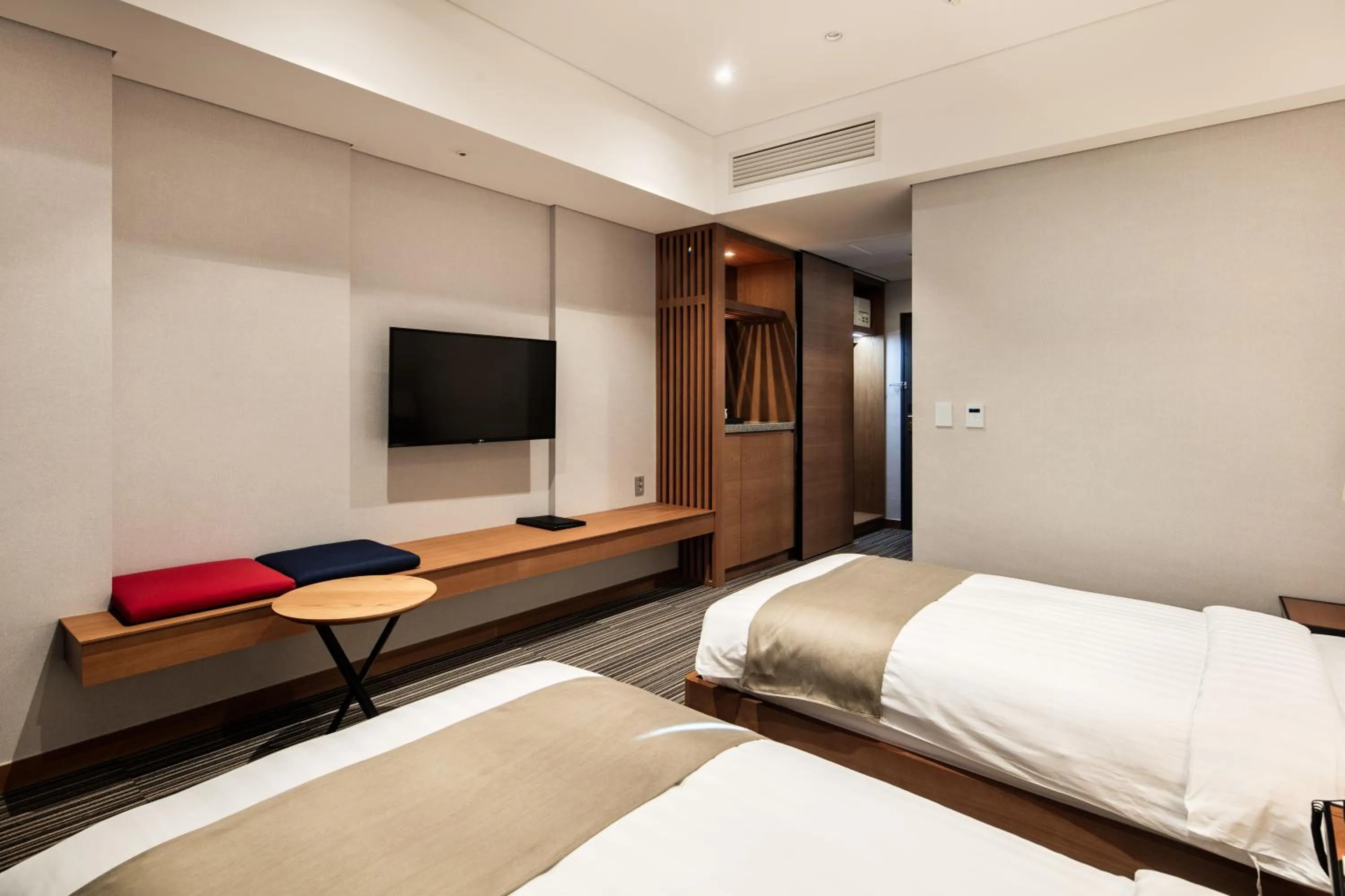 Bed in Golden Tulip Incheon Airport Hotel