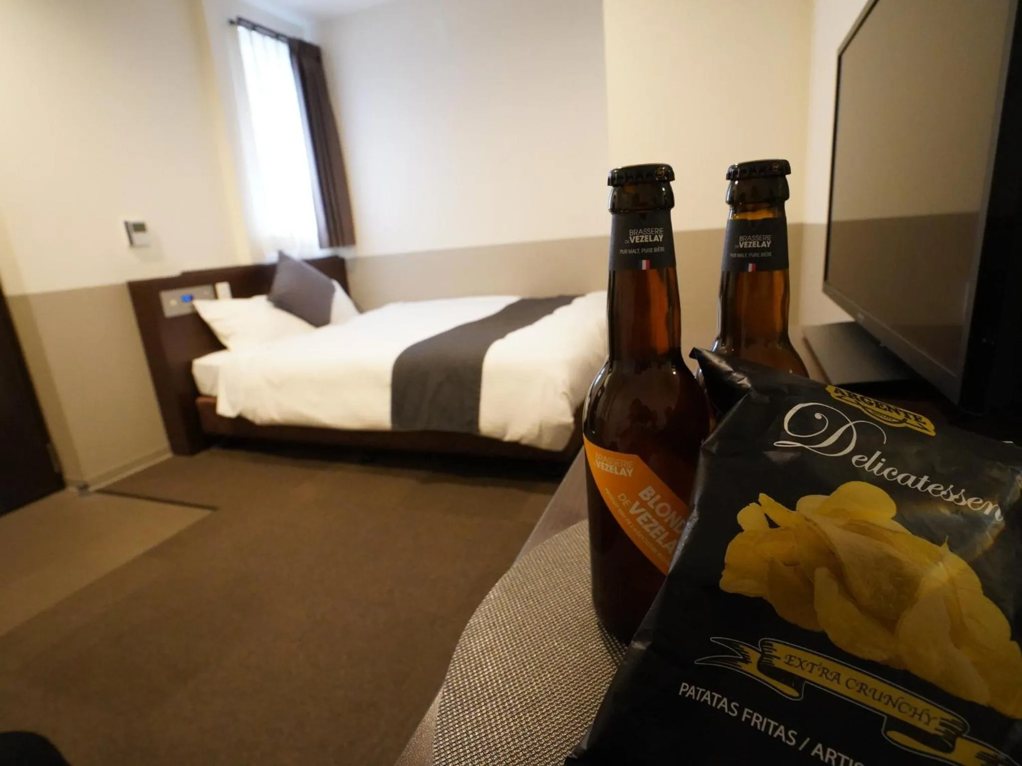 Photo of the whole room, Bed in Hotel New Gaea Domemae