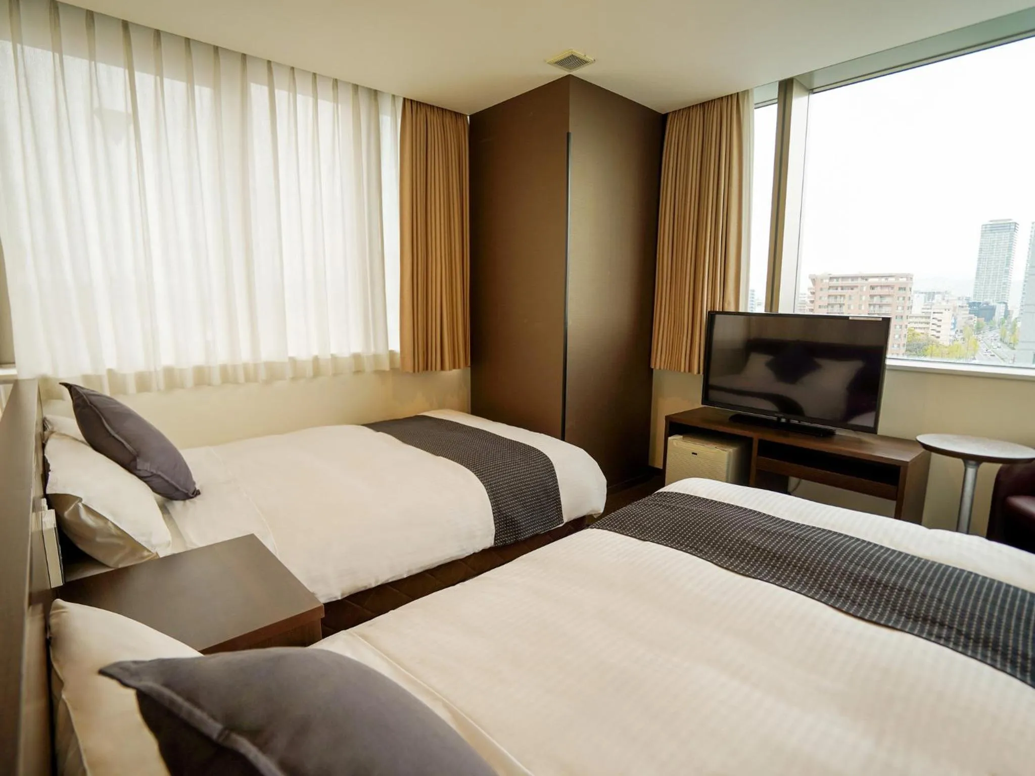 Photo of the whole room, Bed in Hotel New Gaea Domemae