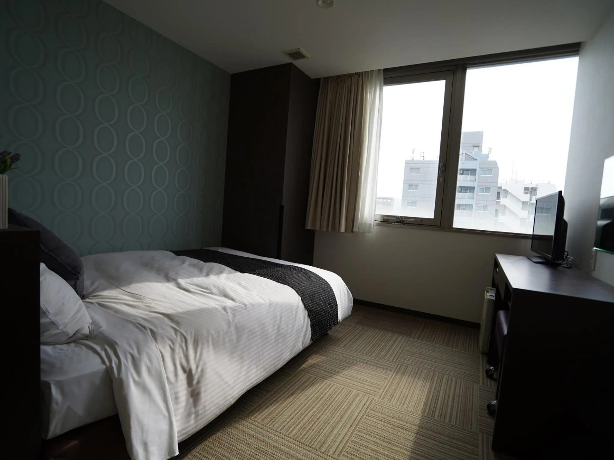 Photo of the whole room, Bed in Hotel New Gaea Domemae