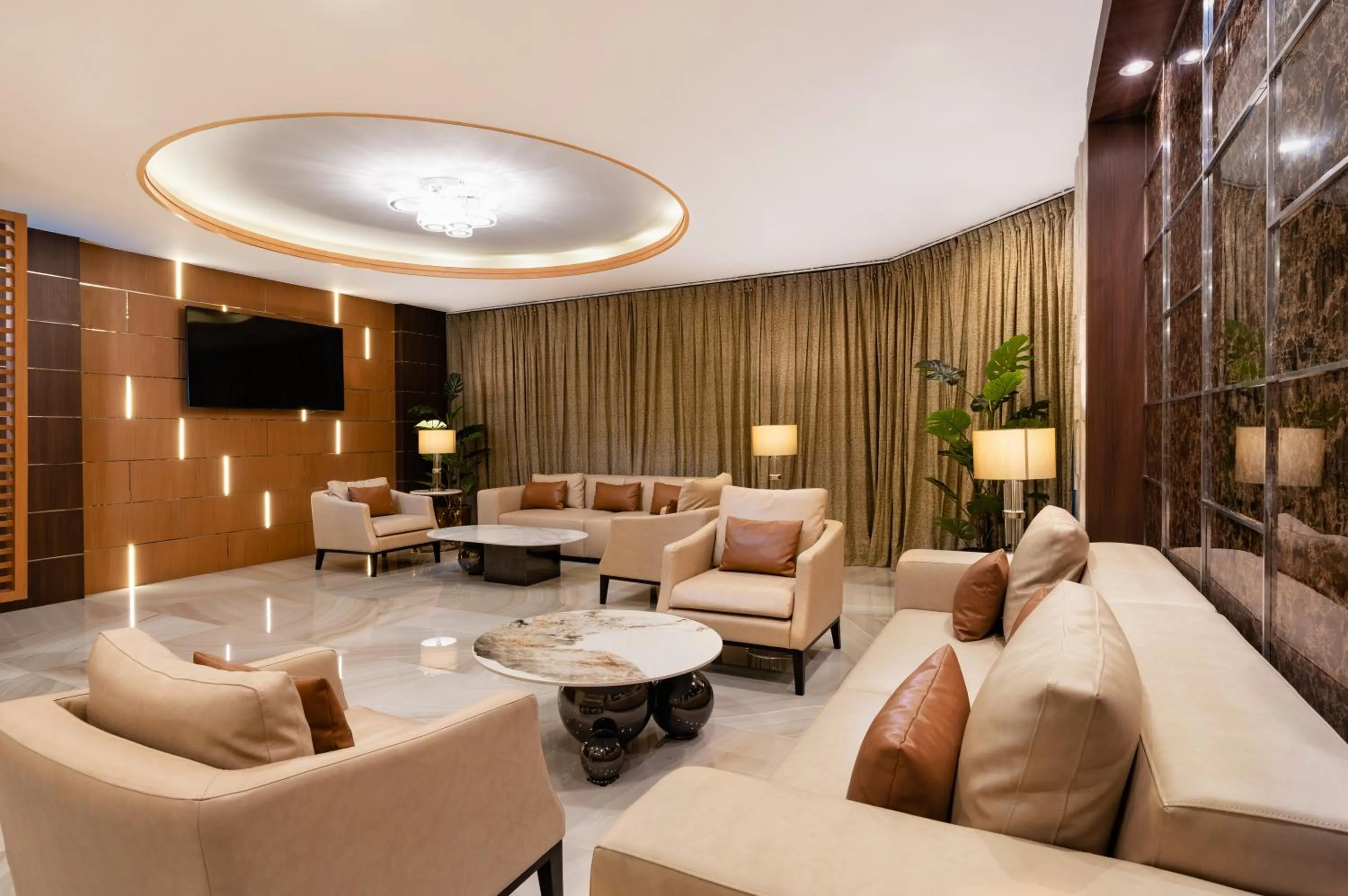 Communal lounge/ TV room in Clarian Hotel Beach Patong