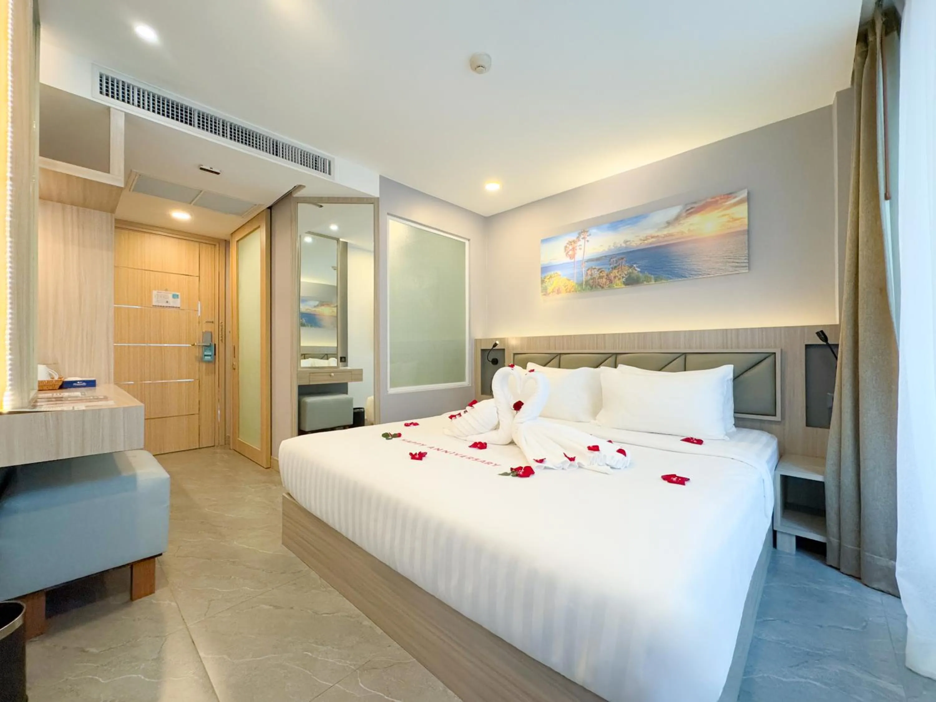 Bed in Clarian Hotel Beach Patong