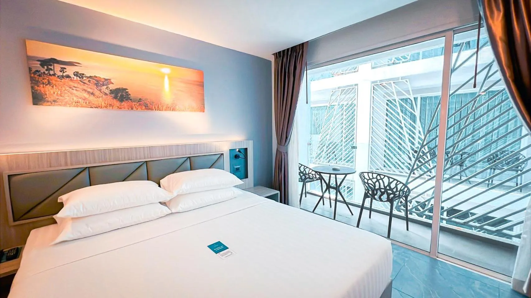 Bed in Clarian Hotel Beach Patong