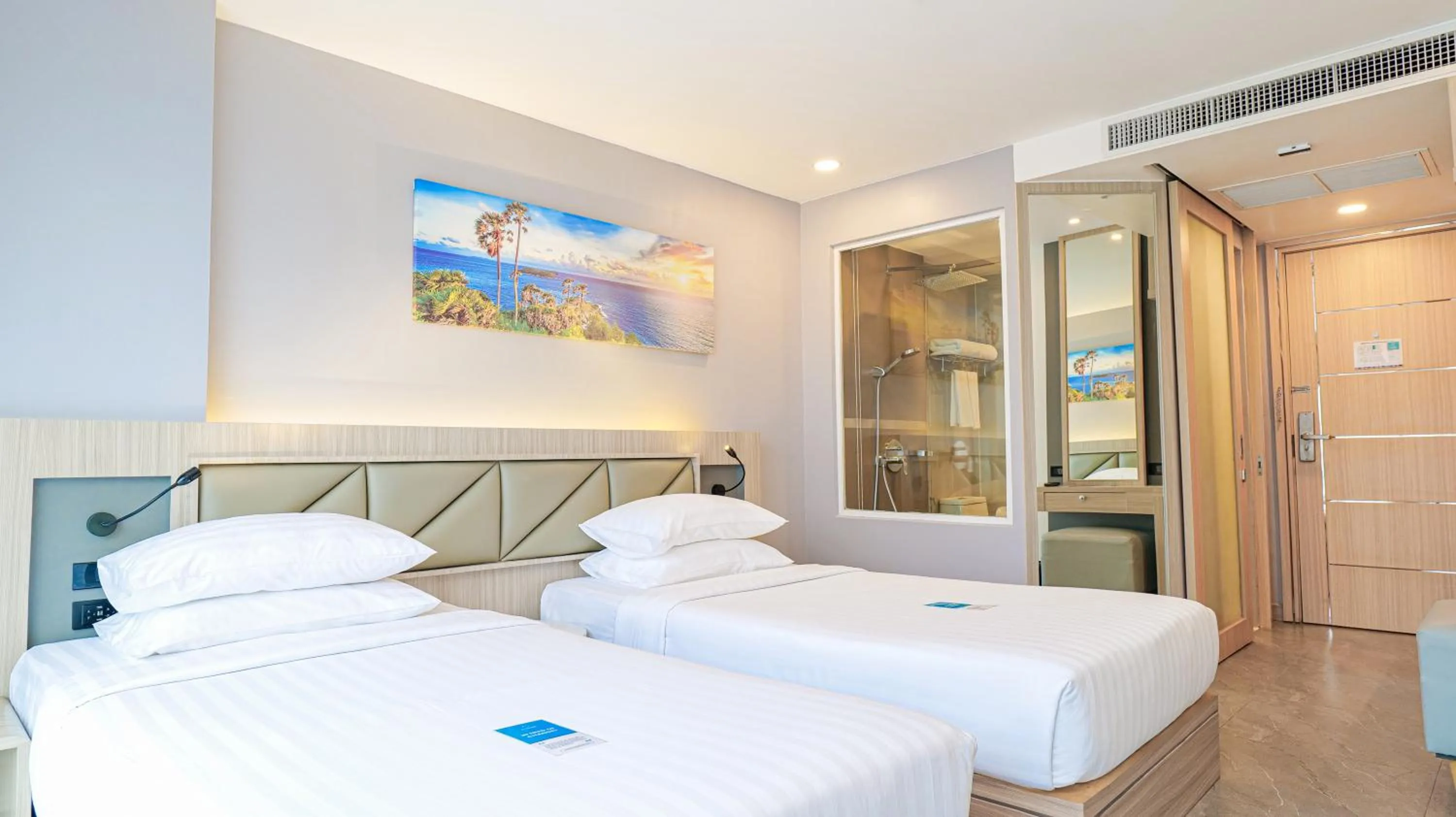 Bed in Clarian Hotel Beach Patong