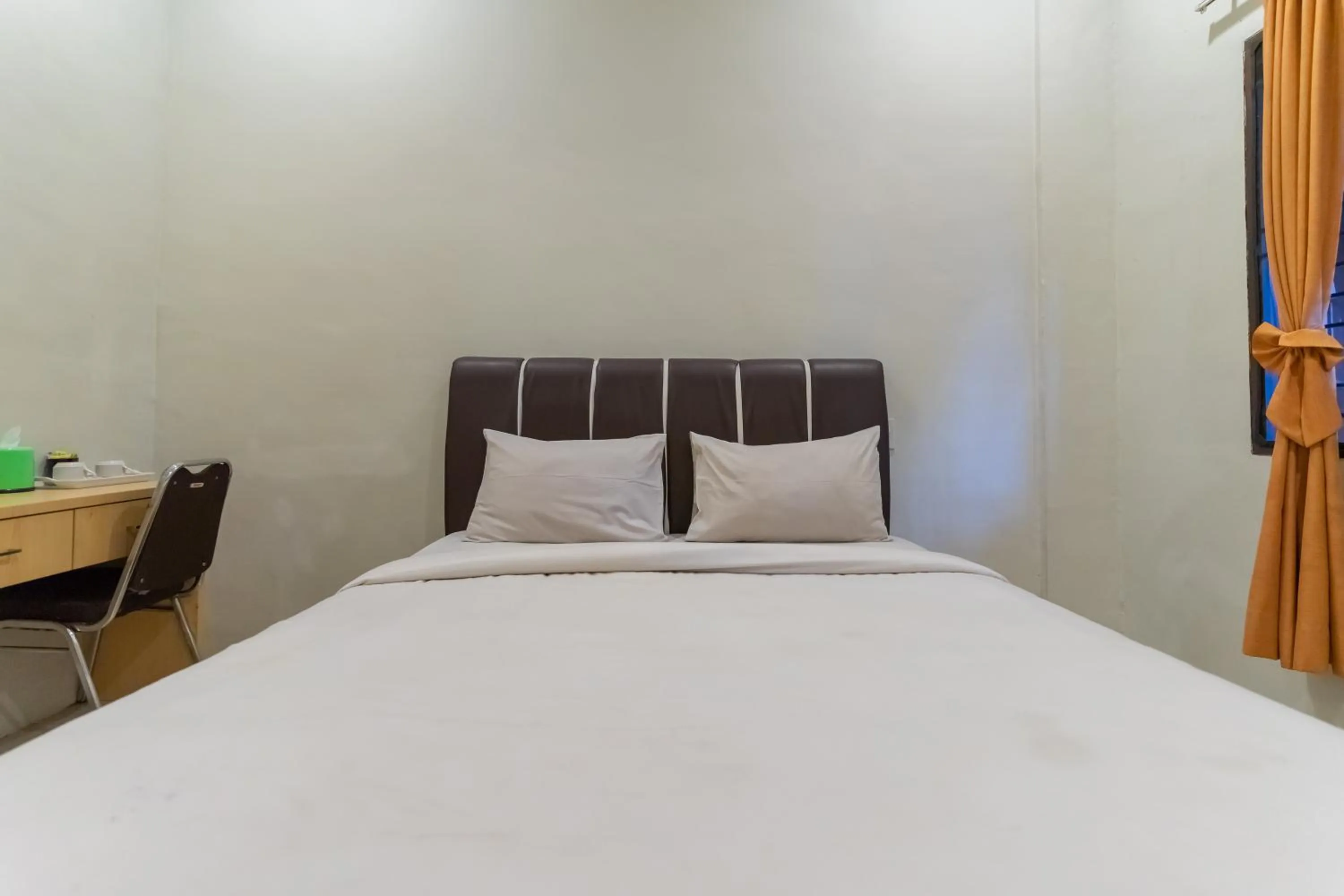 Bed in Vandolia Guest House Medan RedPartner