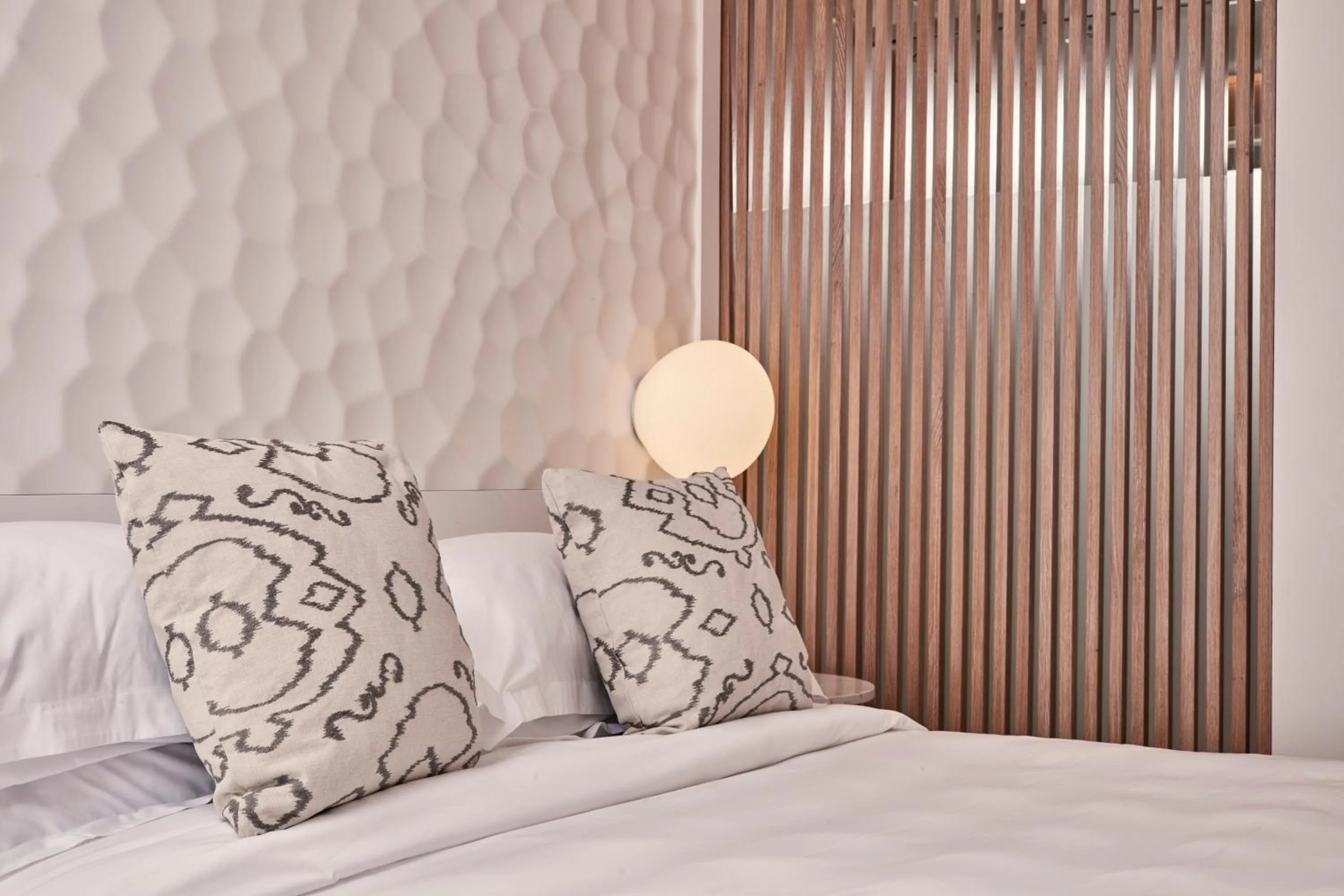 Bed in Myconian Kyma, a Member of Design Hotels