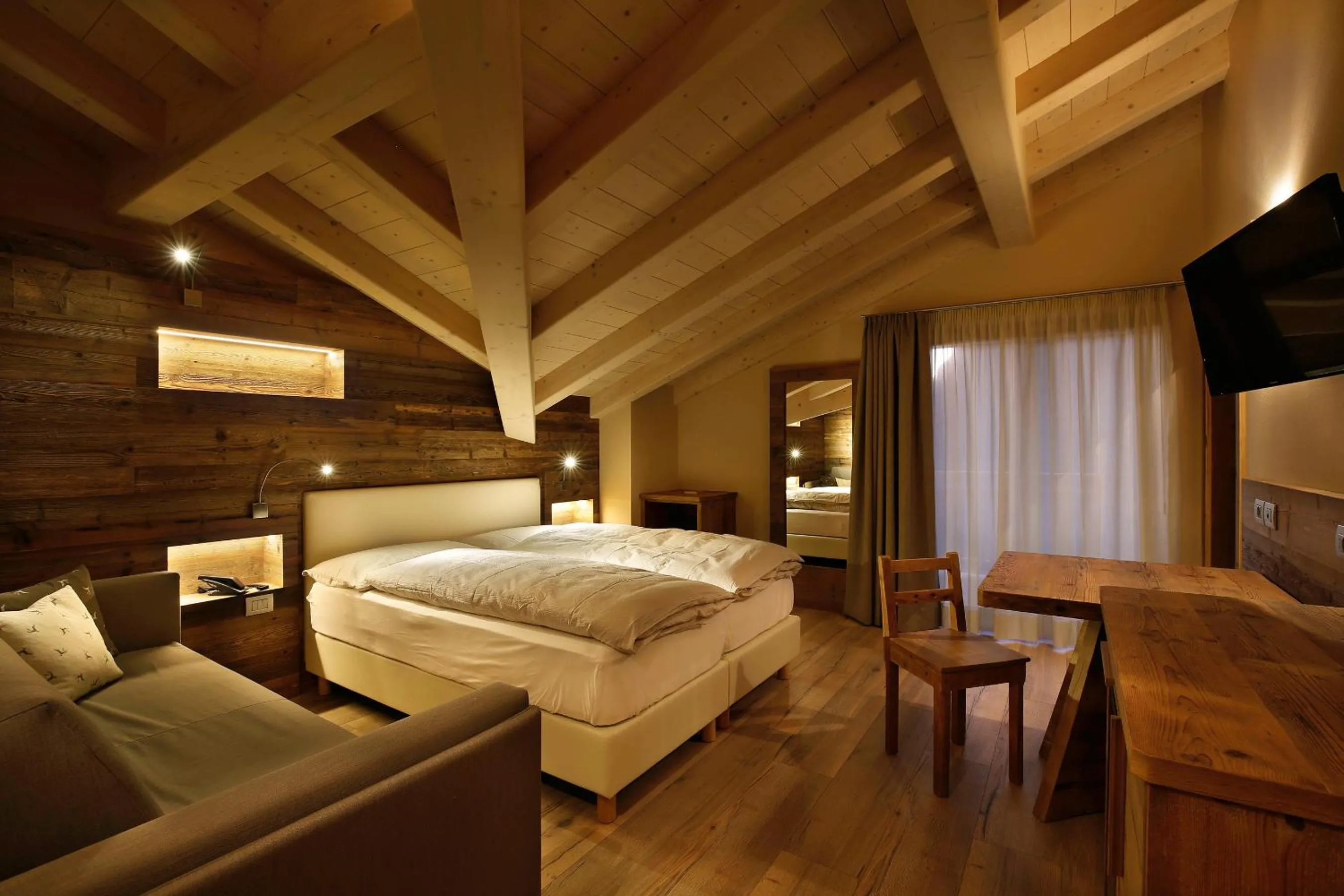 Bed in Albergo Garnì Antico Mas del Medico