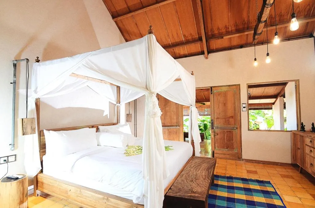 Bed in Desa Alamanis Resort Villa