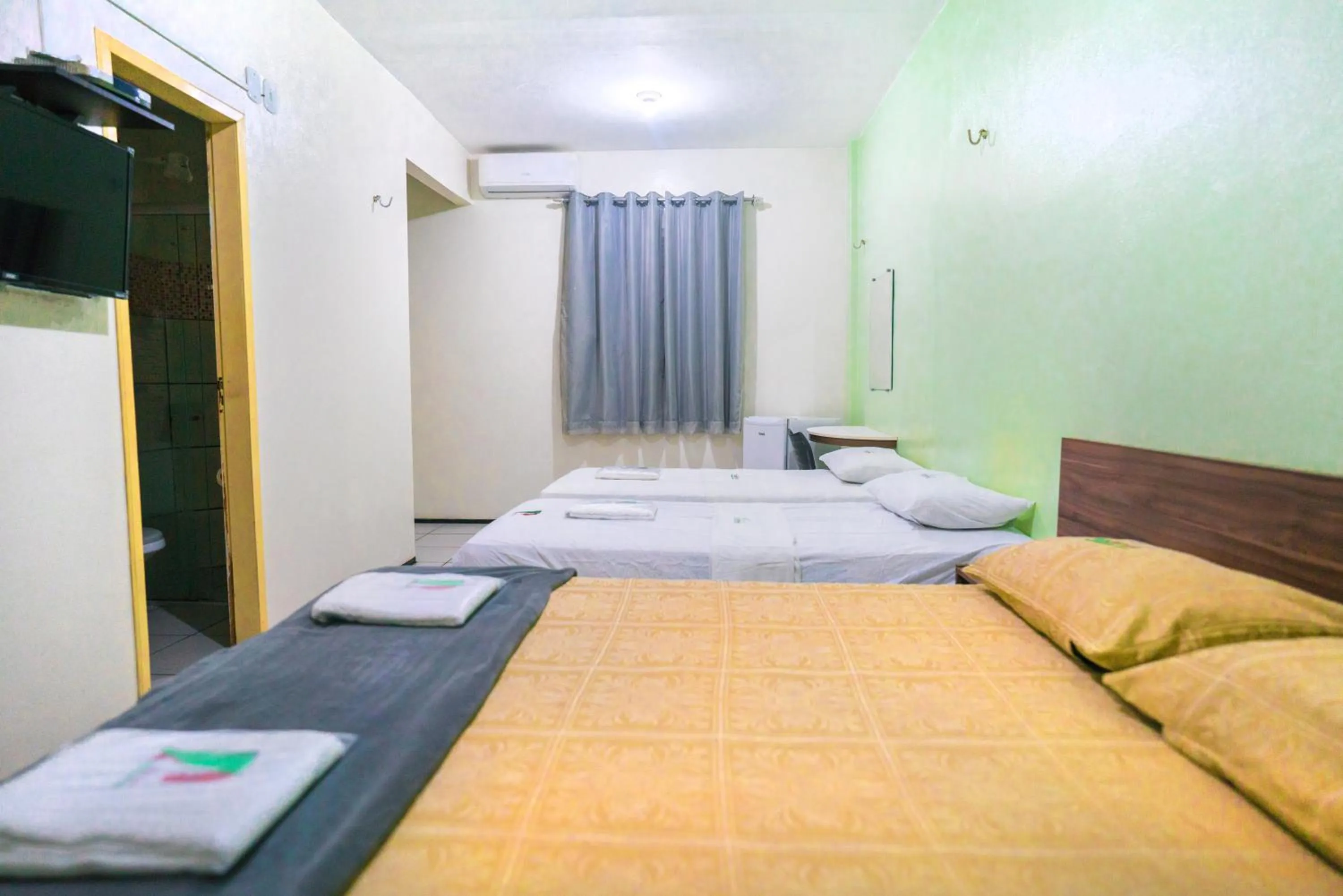 Bed in Hotel Pinheiro