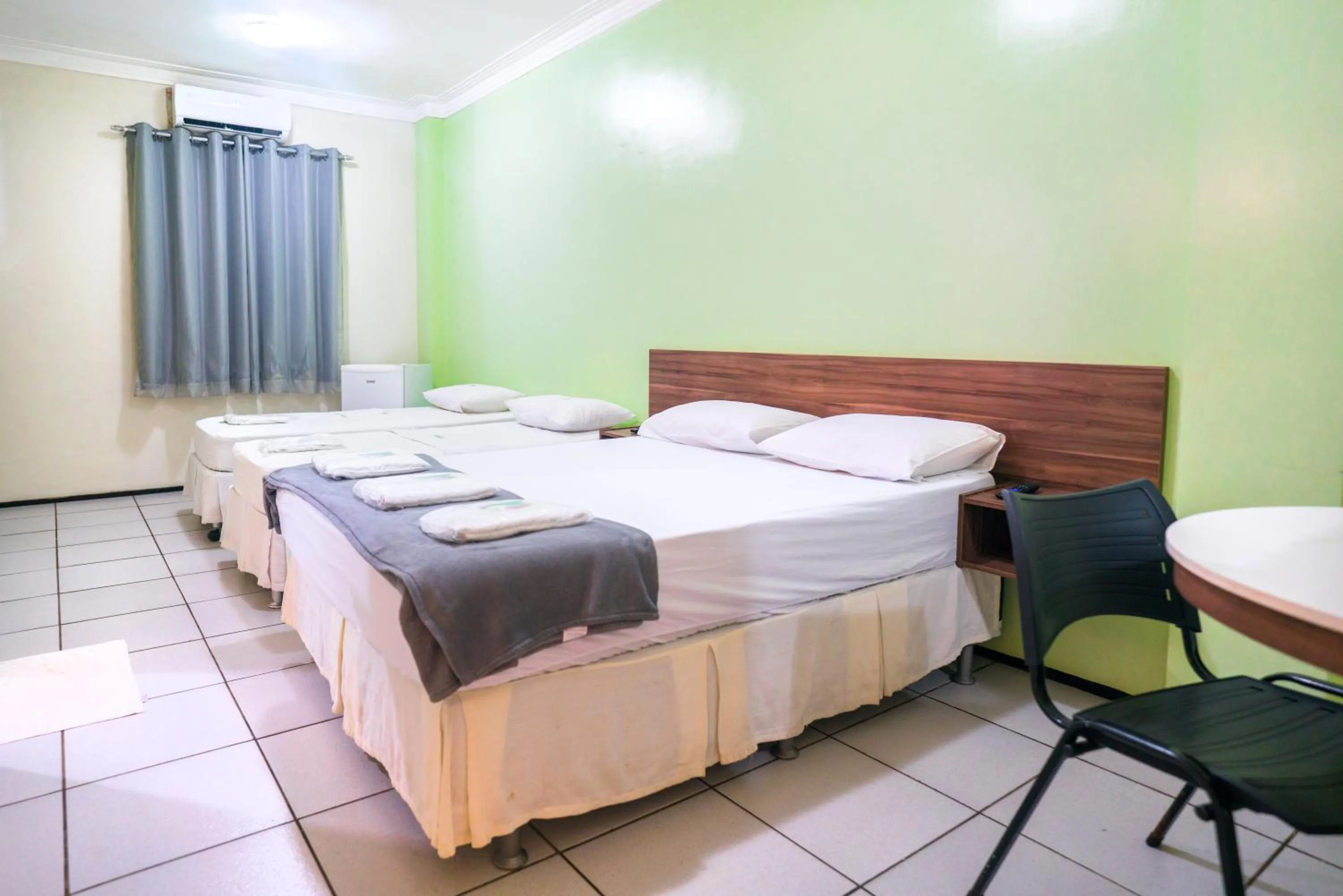 Bed in Hotel Pinheiro