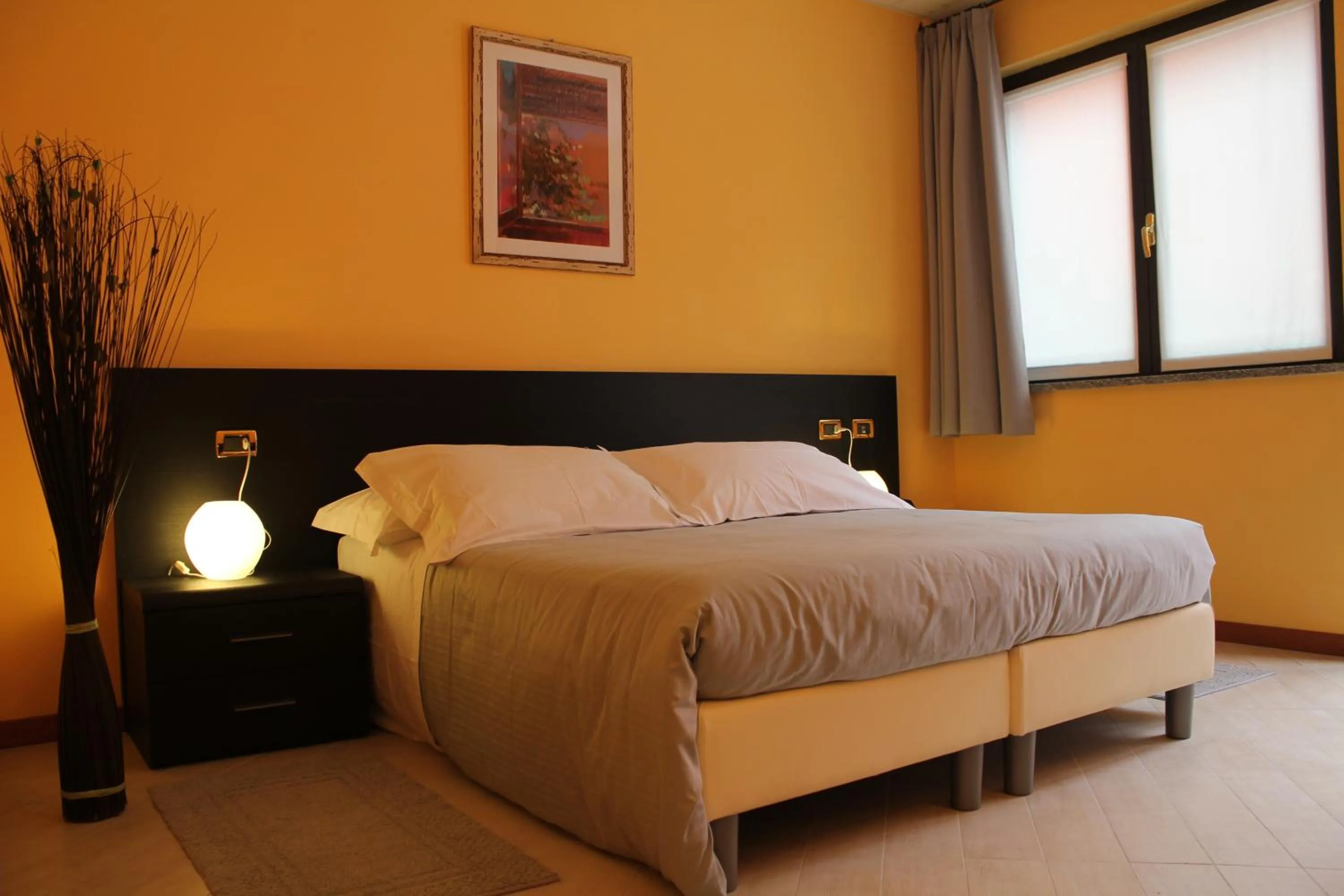 Bedroom, Bed in Hotel Padus Meublè Parma