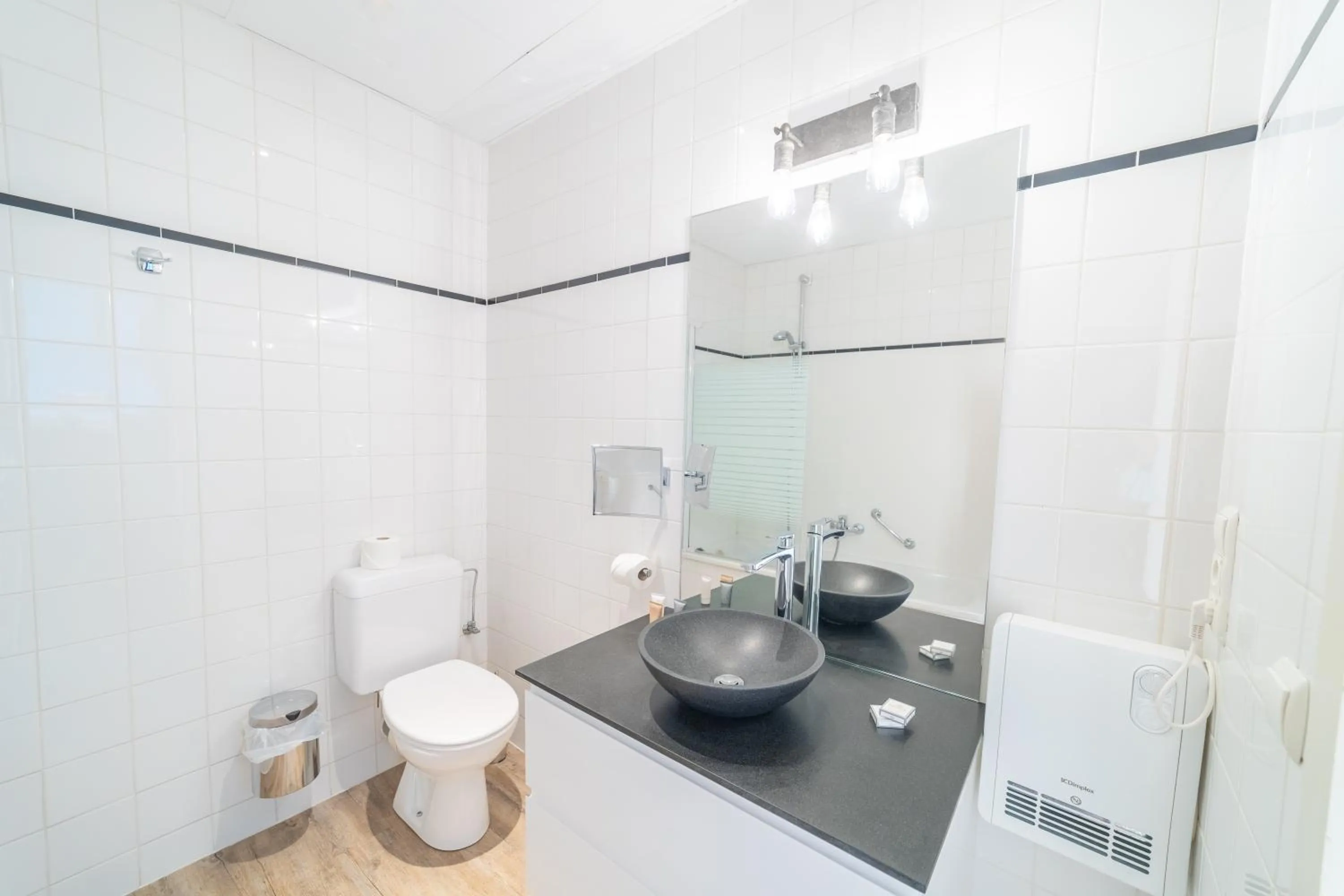 Bathroom in Hotel Het Gheestelic Hof by CW Hotel Collection