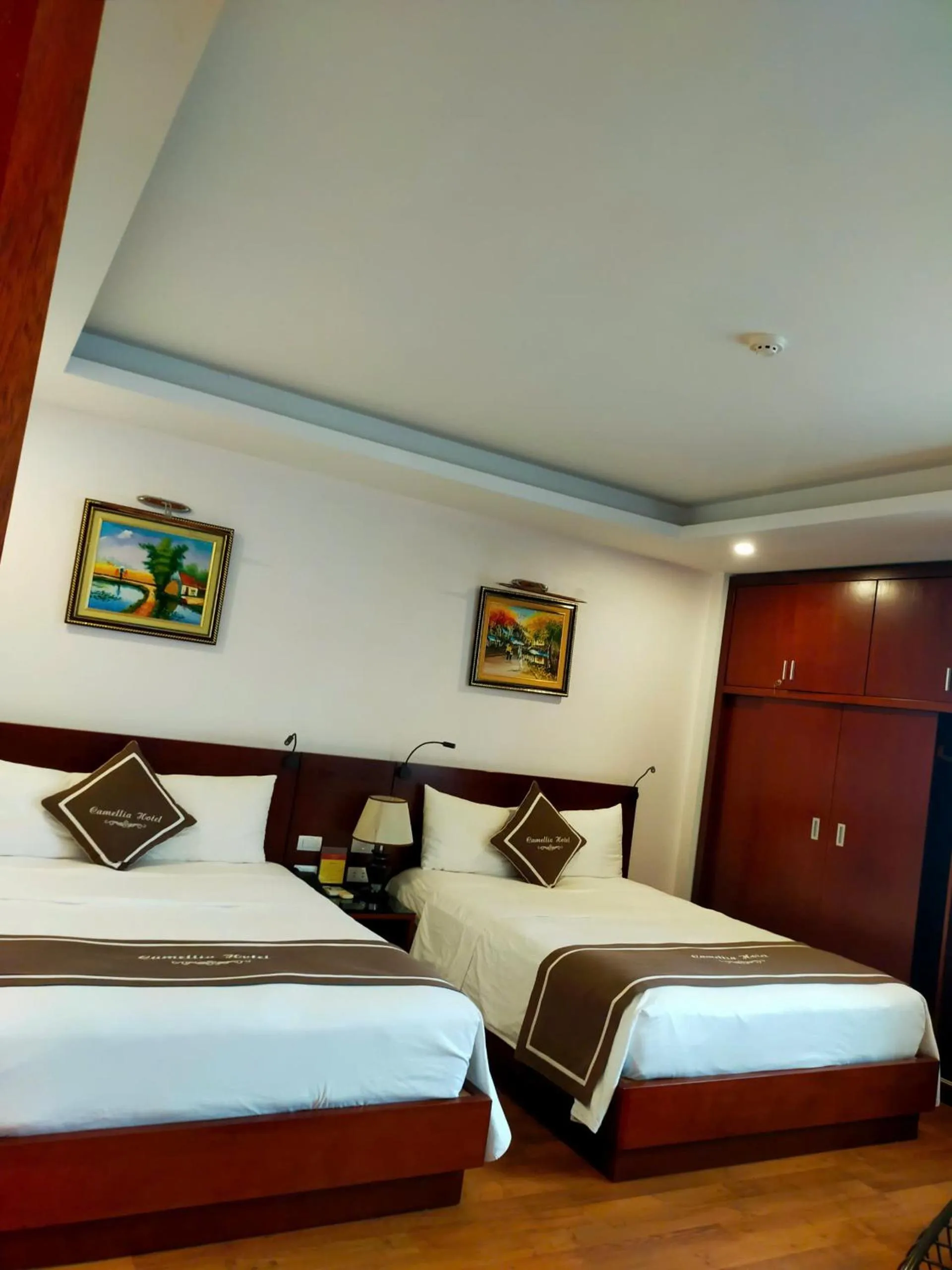 Bed in Camellia Hotel