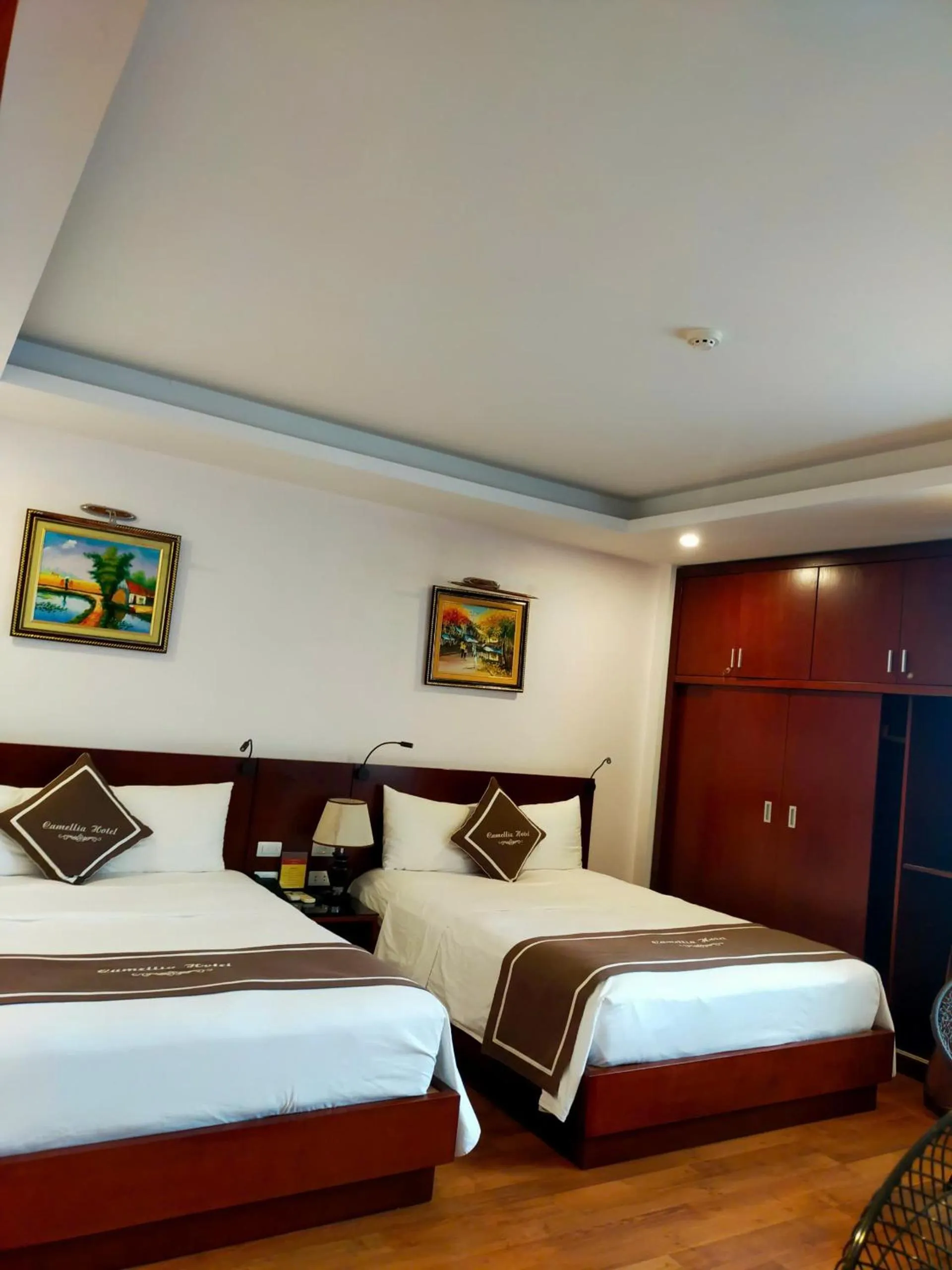 Bed in Camellia Hotel