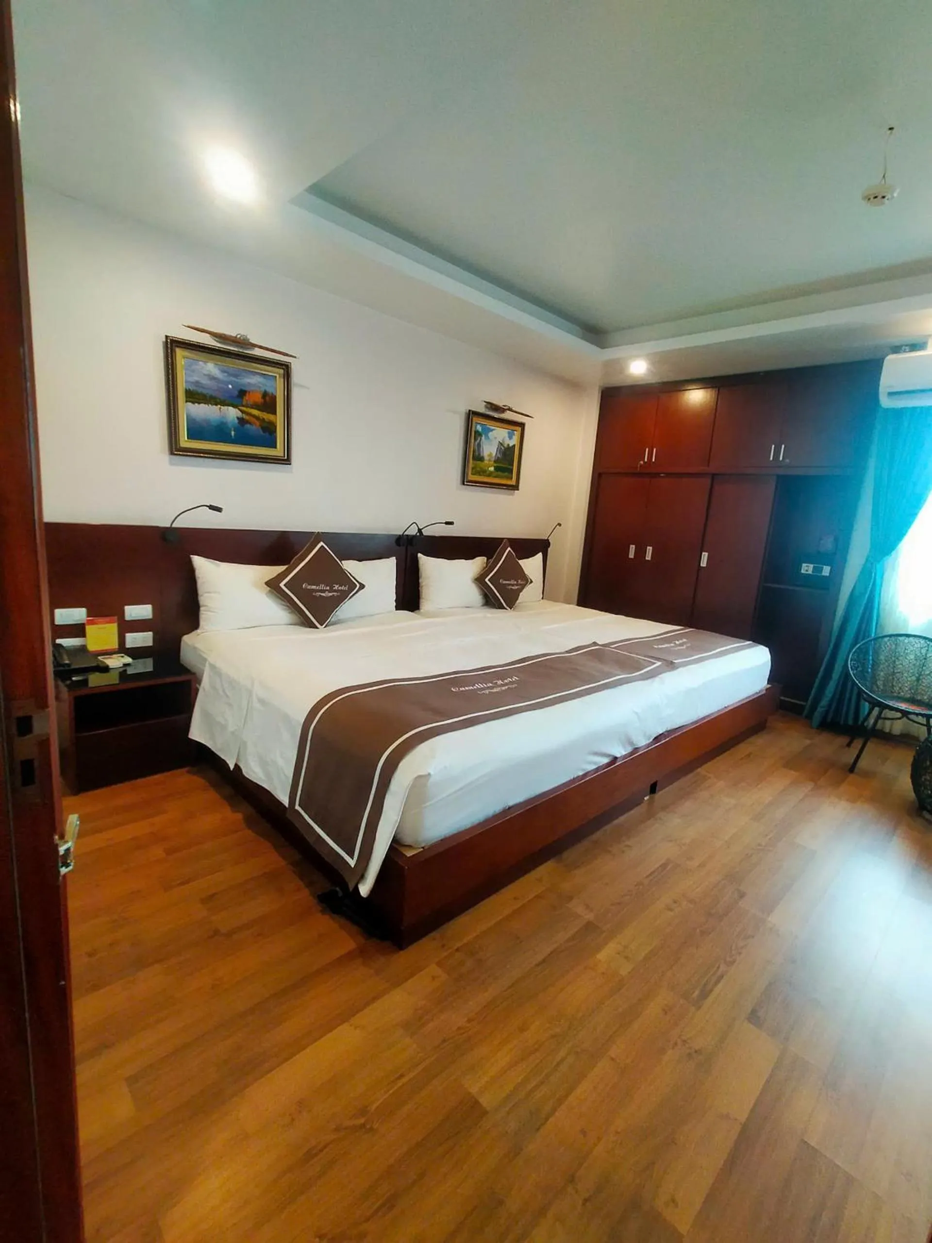 Bed in Camellia Hotel