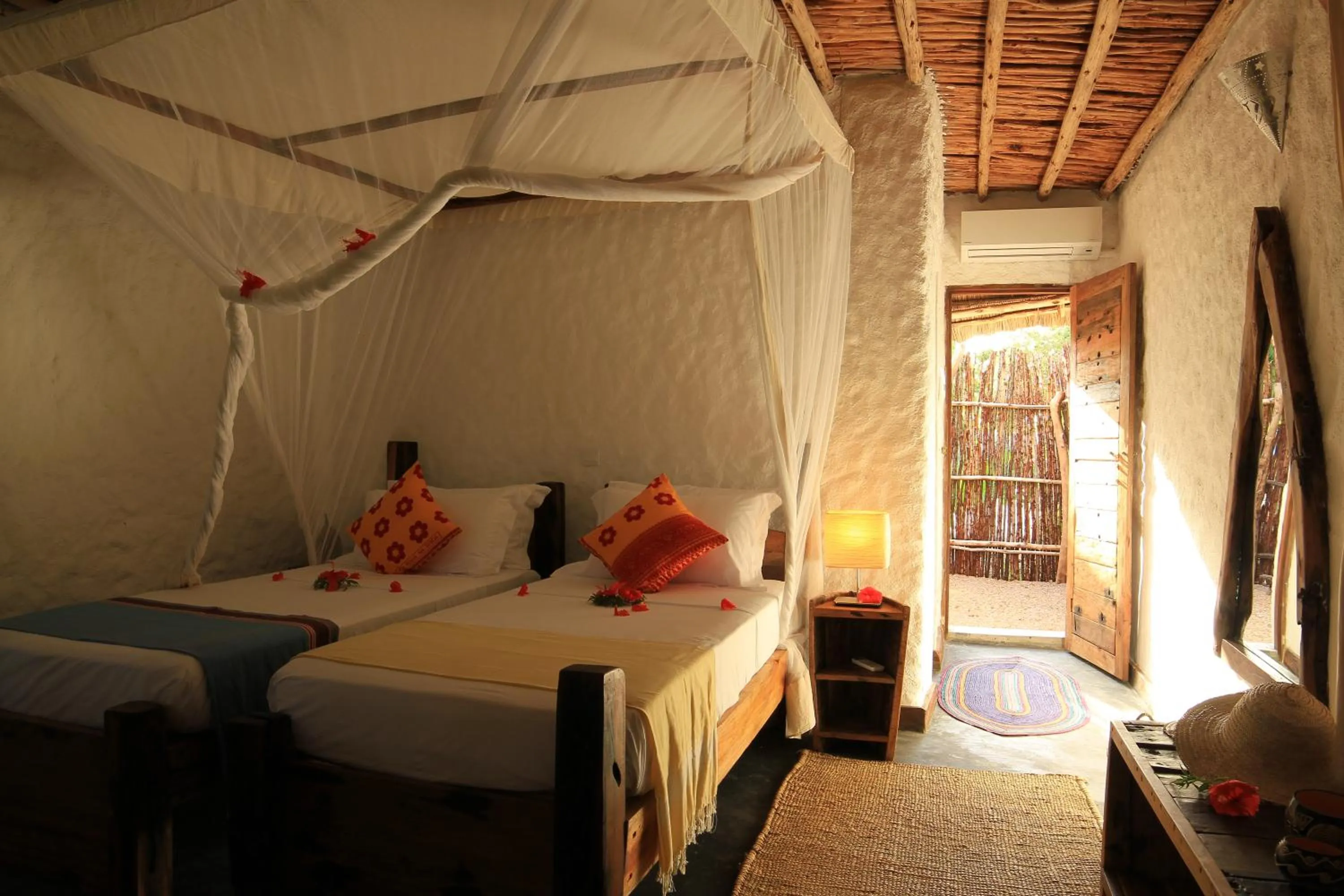 Bed in Ujamaa Beach Resort