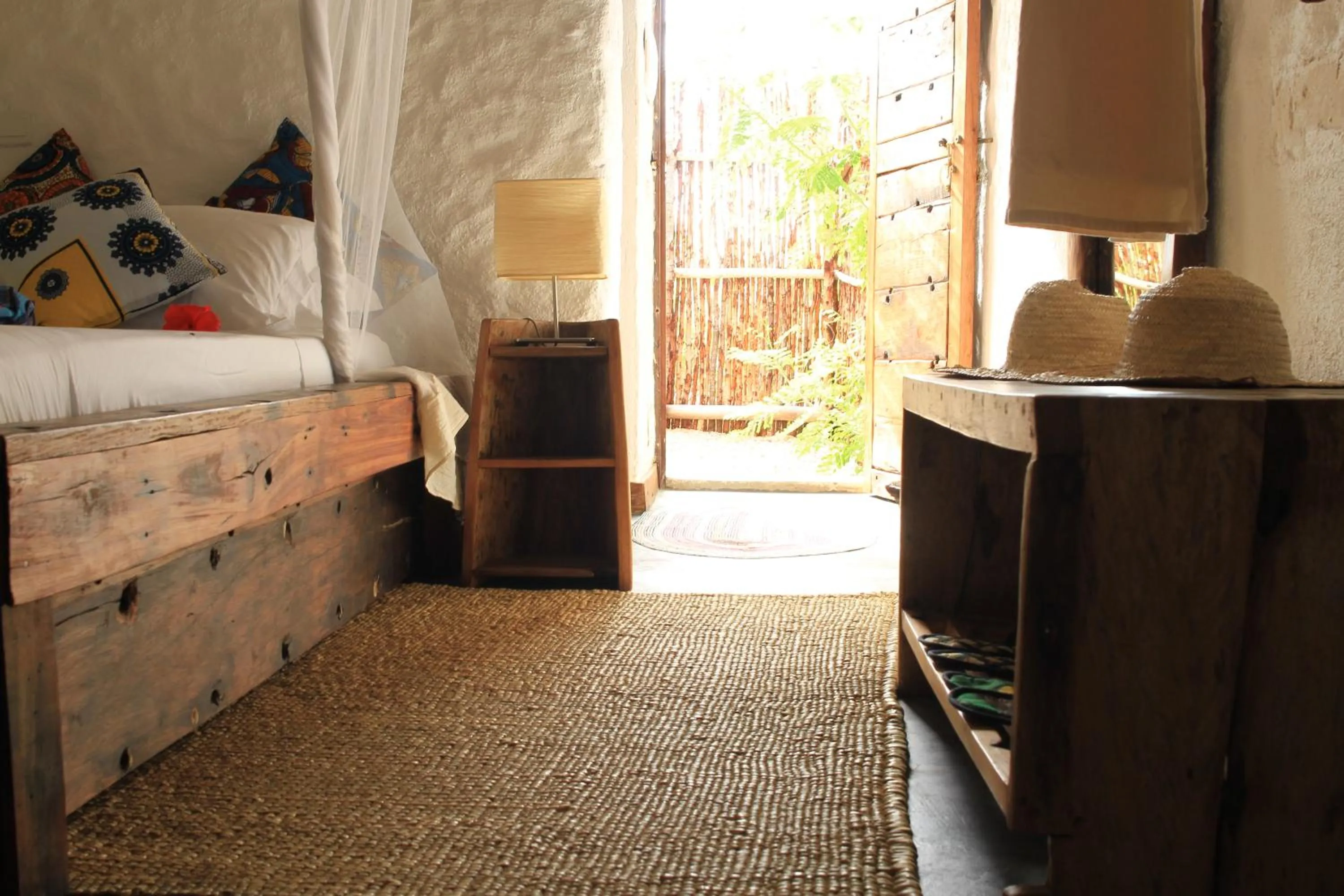 Photo of the whole room, Bed in Ujamaa Beach Resort