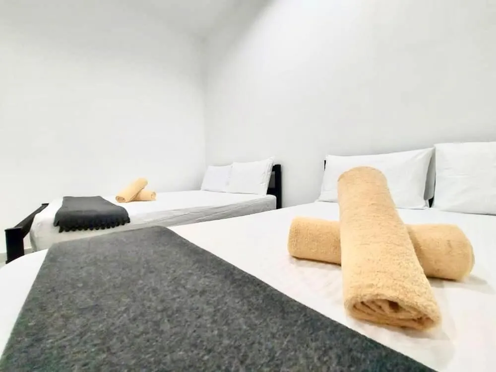 Bed in Belukar Lodges Private Homestay