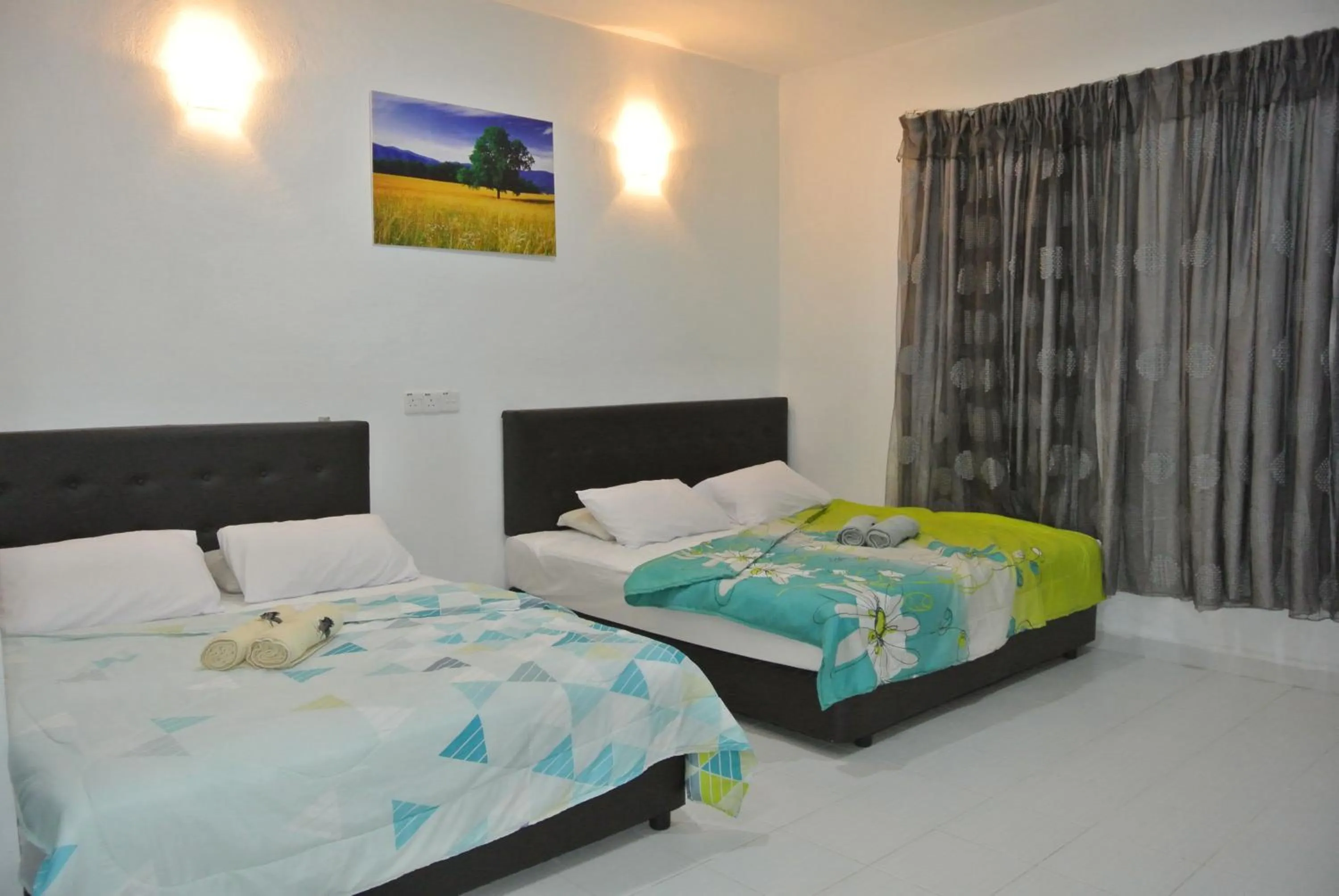 Photo of the whole room, Bed in Wave Langkawi Inn