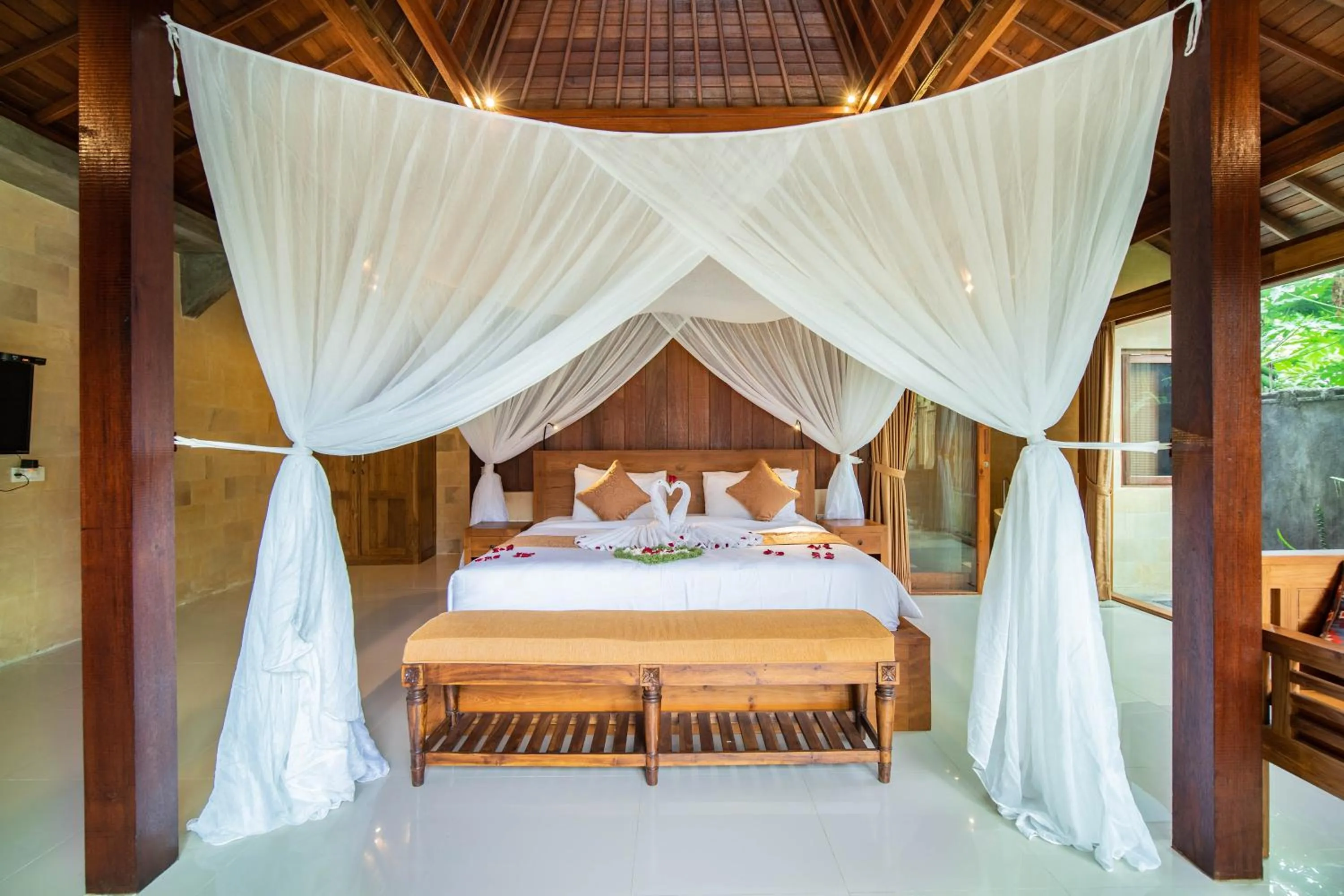 Bed in Naja Private Villa Ubud