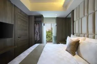 Bed in The Crystal Luxury Bay Resort Nusa Dua