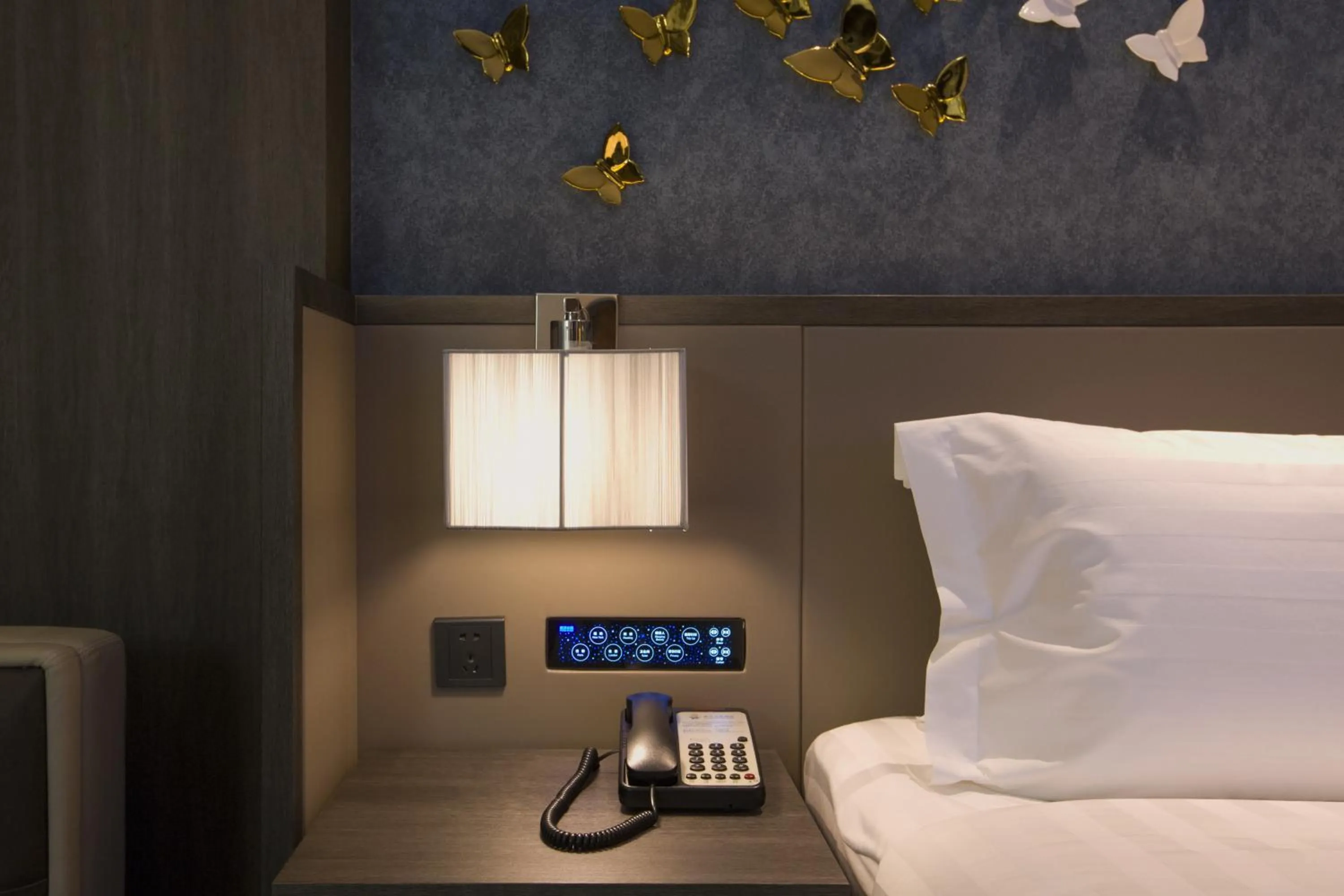 Decorative detail, Bed in Crystal Orange Hotel Guangzhou Taojin Branch