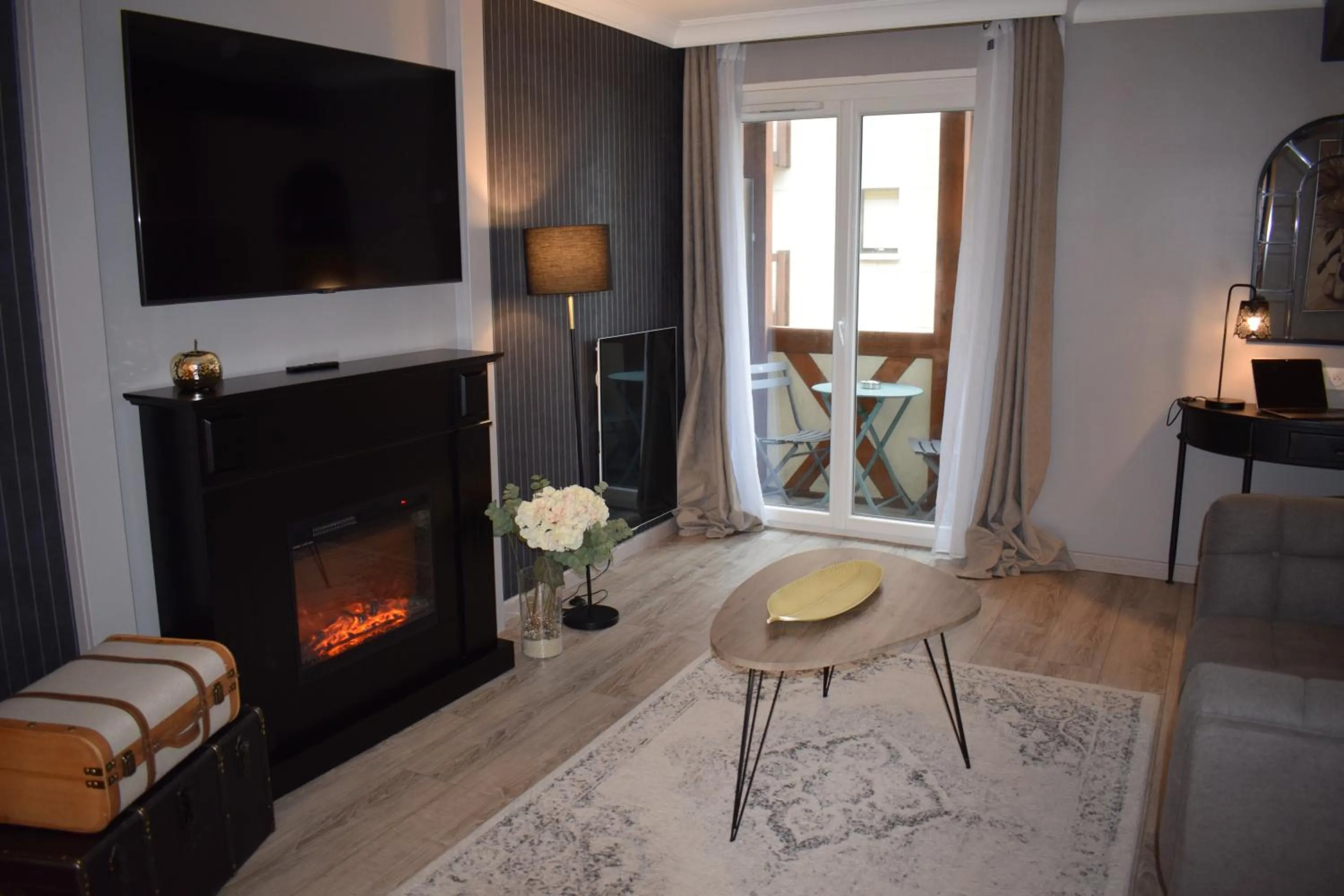 Living room in Le Trophée Boutique Hôtel Spa- La Loggia Appart'hôtel