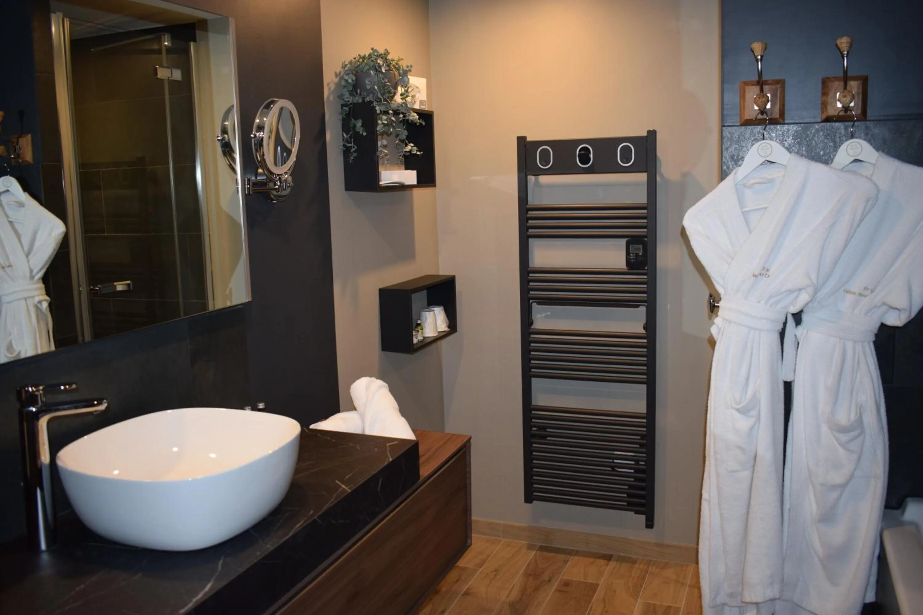 Bathroom in Le Trophée Boutique Hôtel Spa- La Loggia Appart'hôtel