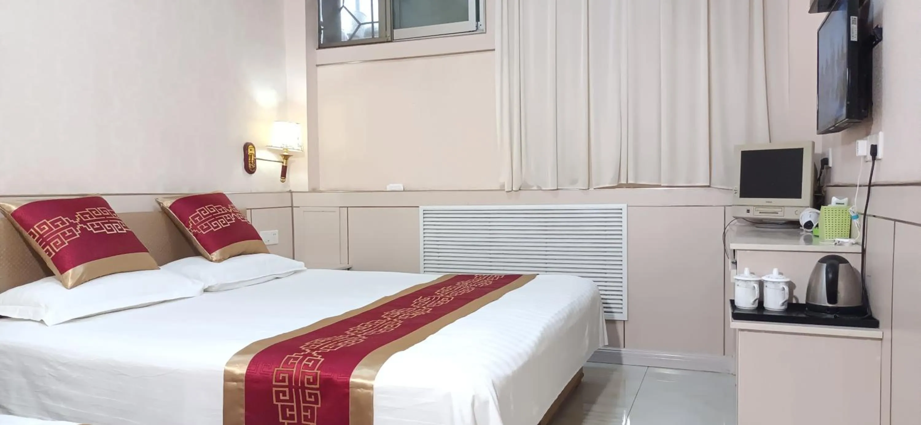 Bed in Qufu Garden Hotel