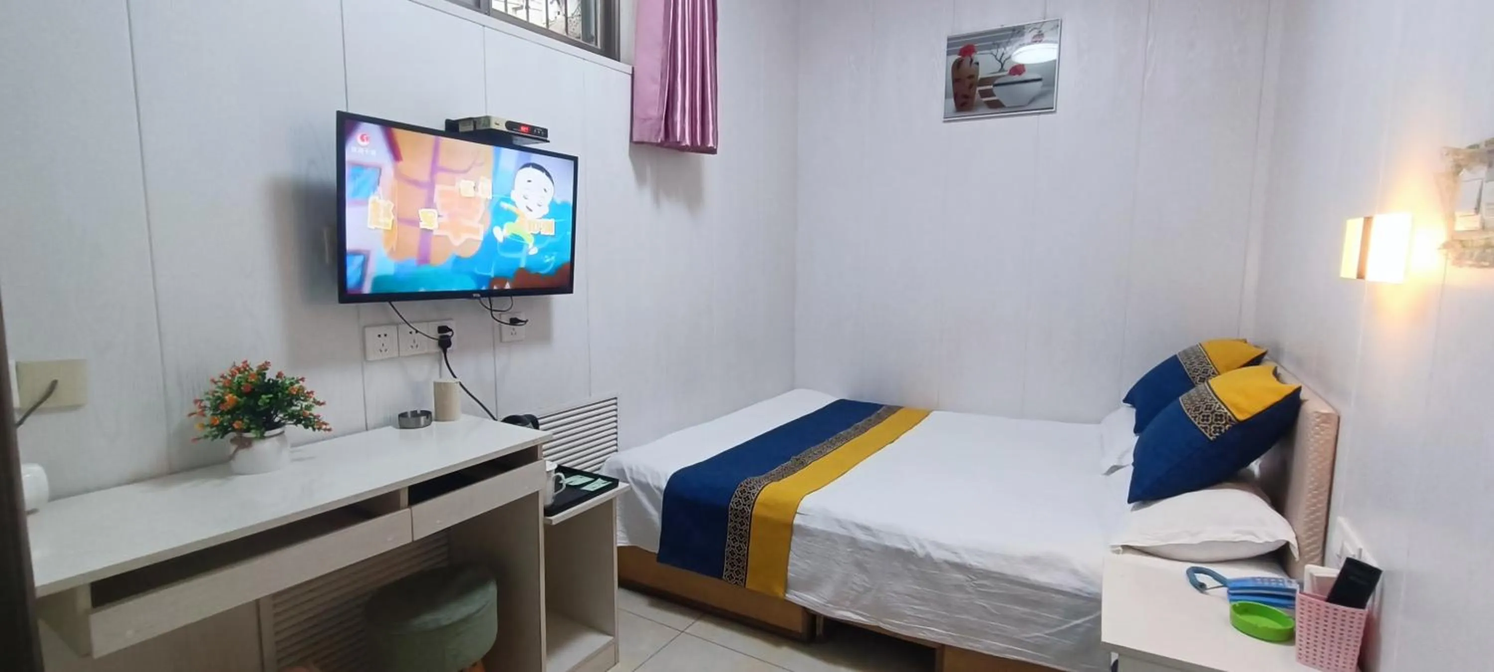 TV and multimedia, Bed in Qufu Garden Hotel
