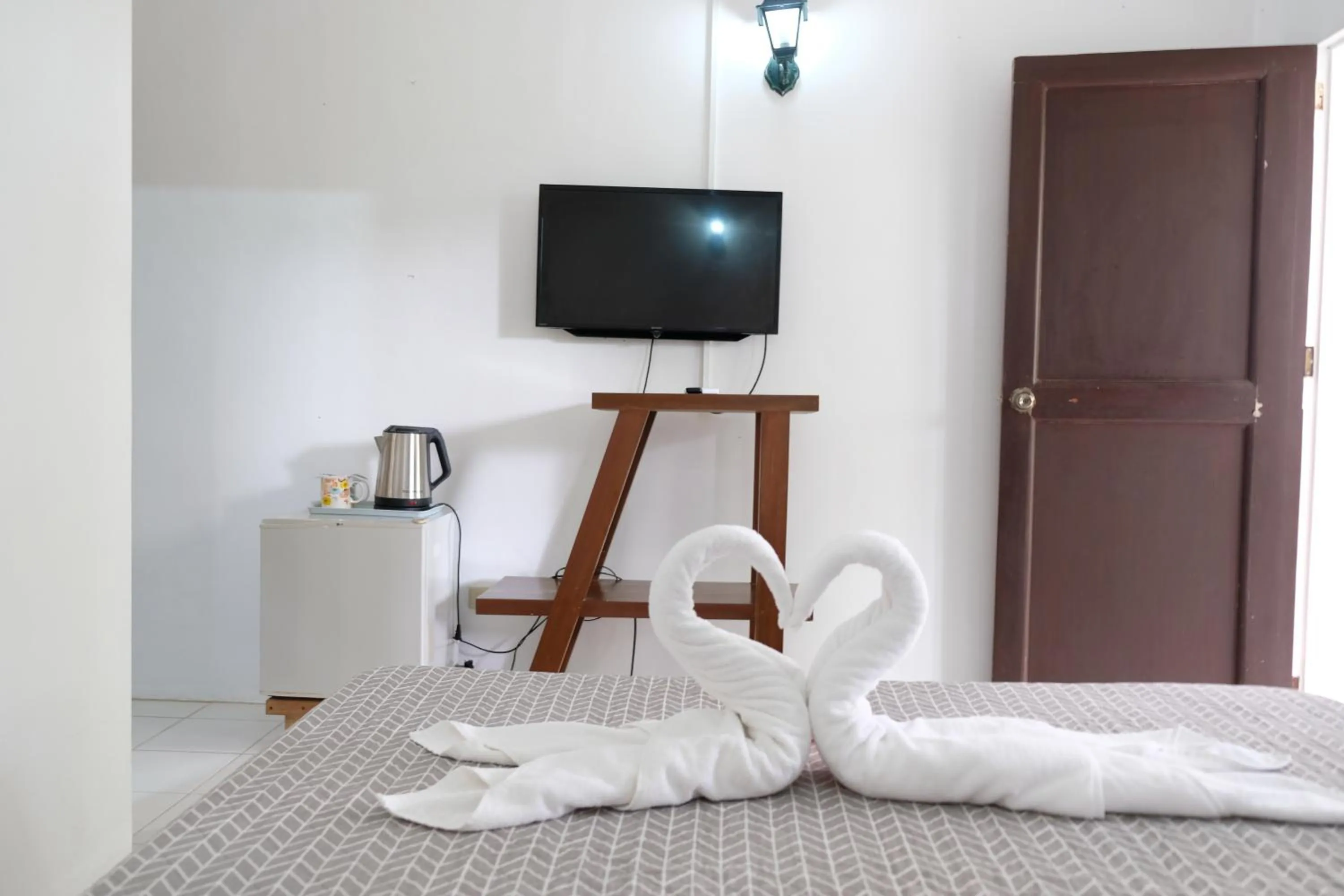 Bedroom, Bed in Sundown Resort & Austrian Pension House