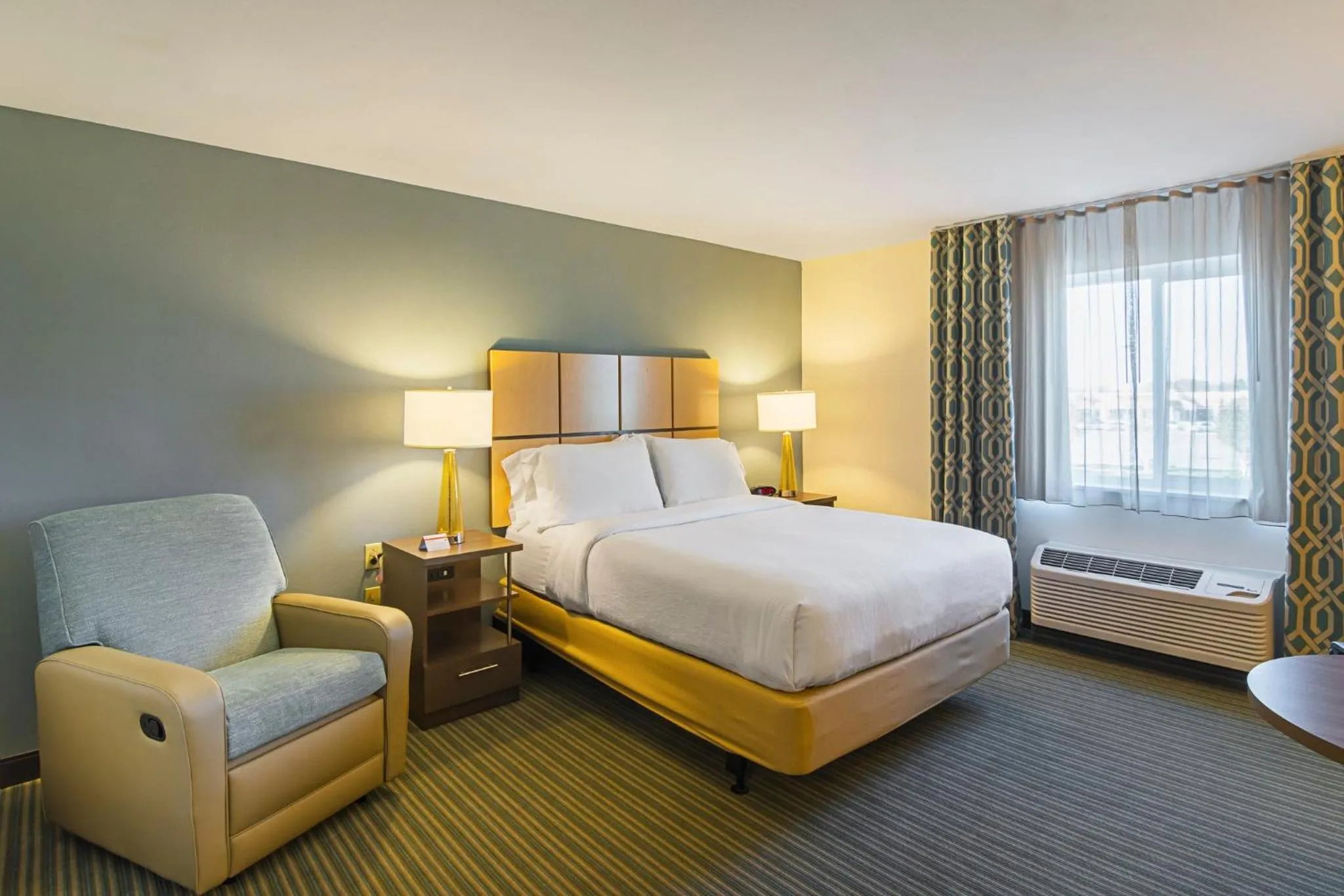 Photo of the whole room, Bed in Candlewood Suites - Pensacola - University Area by IHG