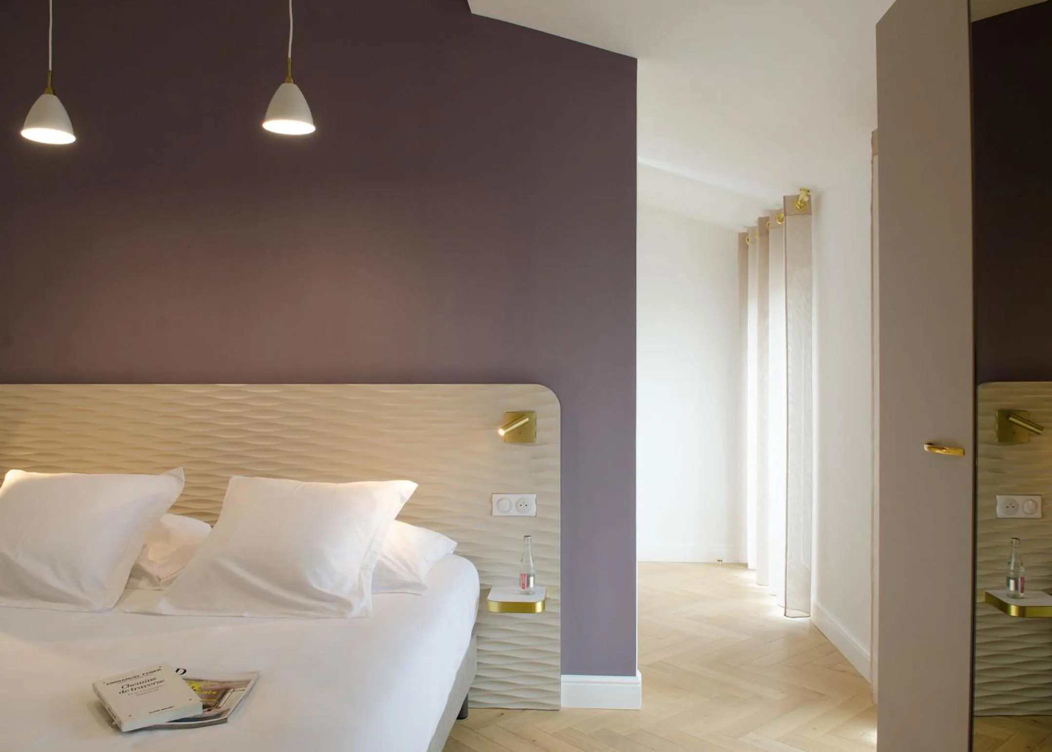 Bed in Hôtel le XIX