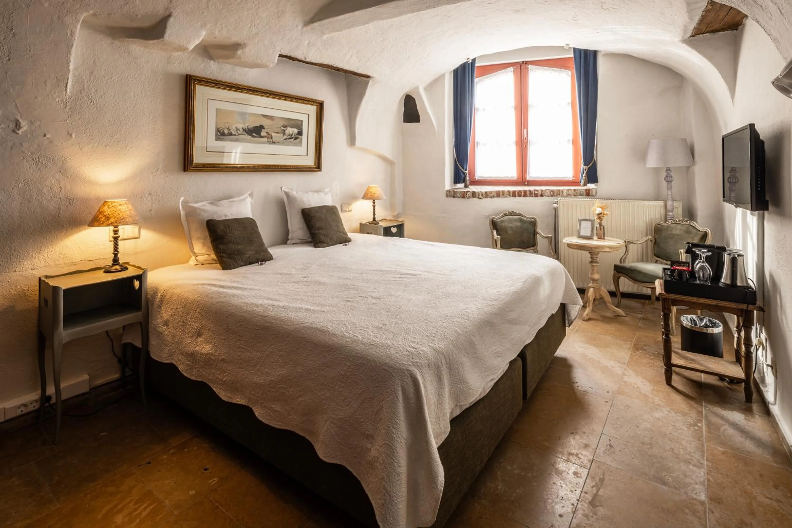 Bed in Canal View Hotel Ter Brughe by CW Hotel Collection