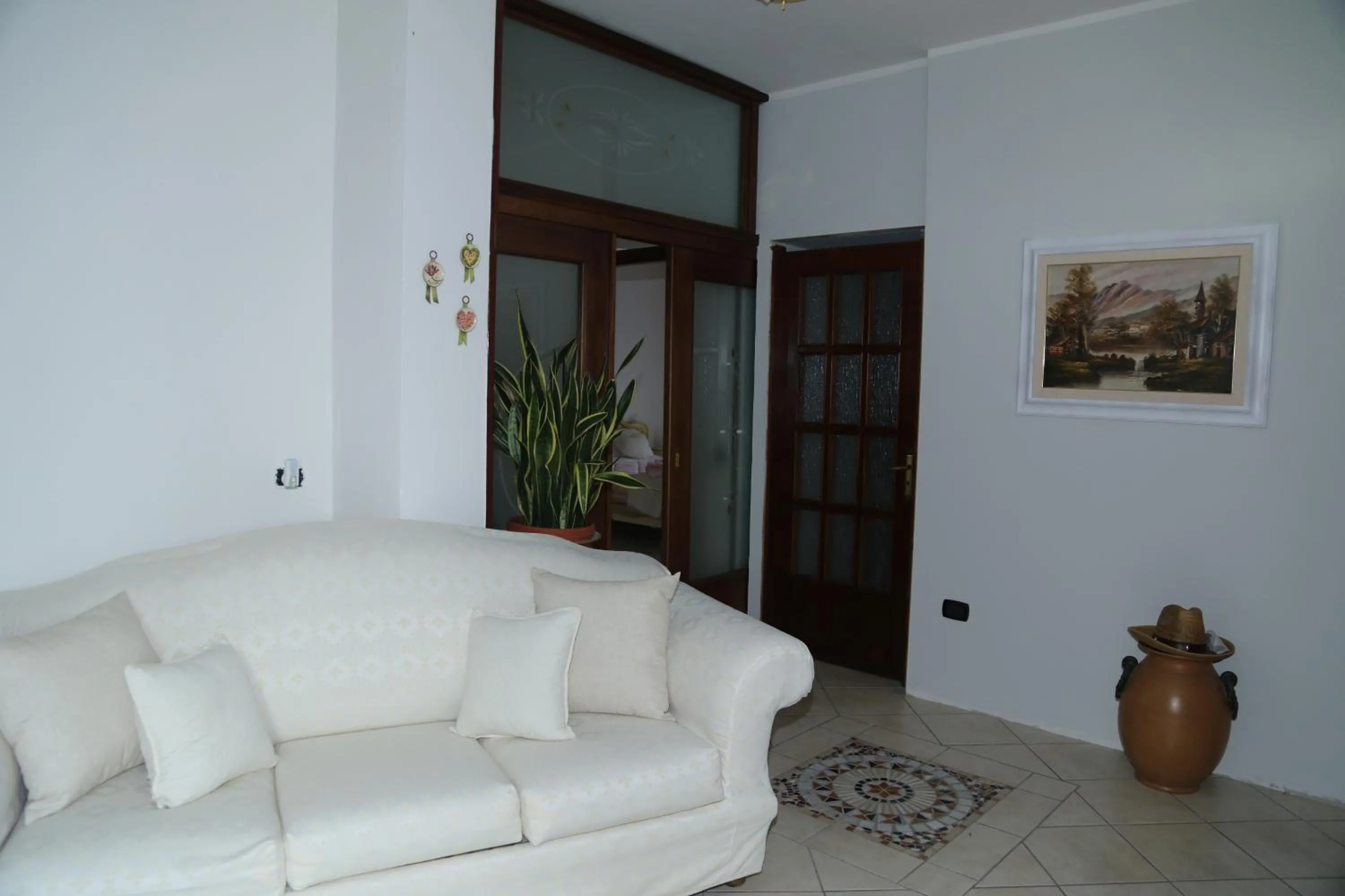 Living room in B&B Maison Blanche