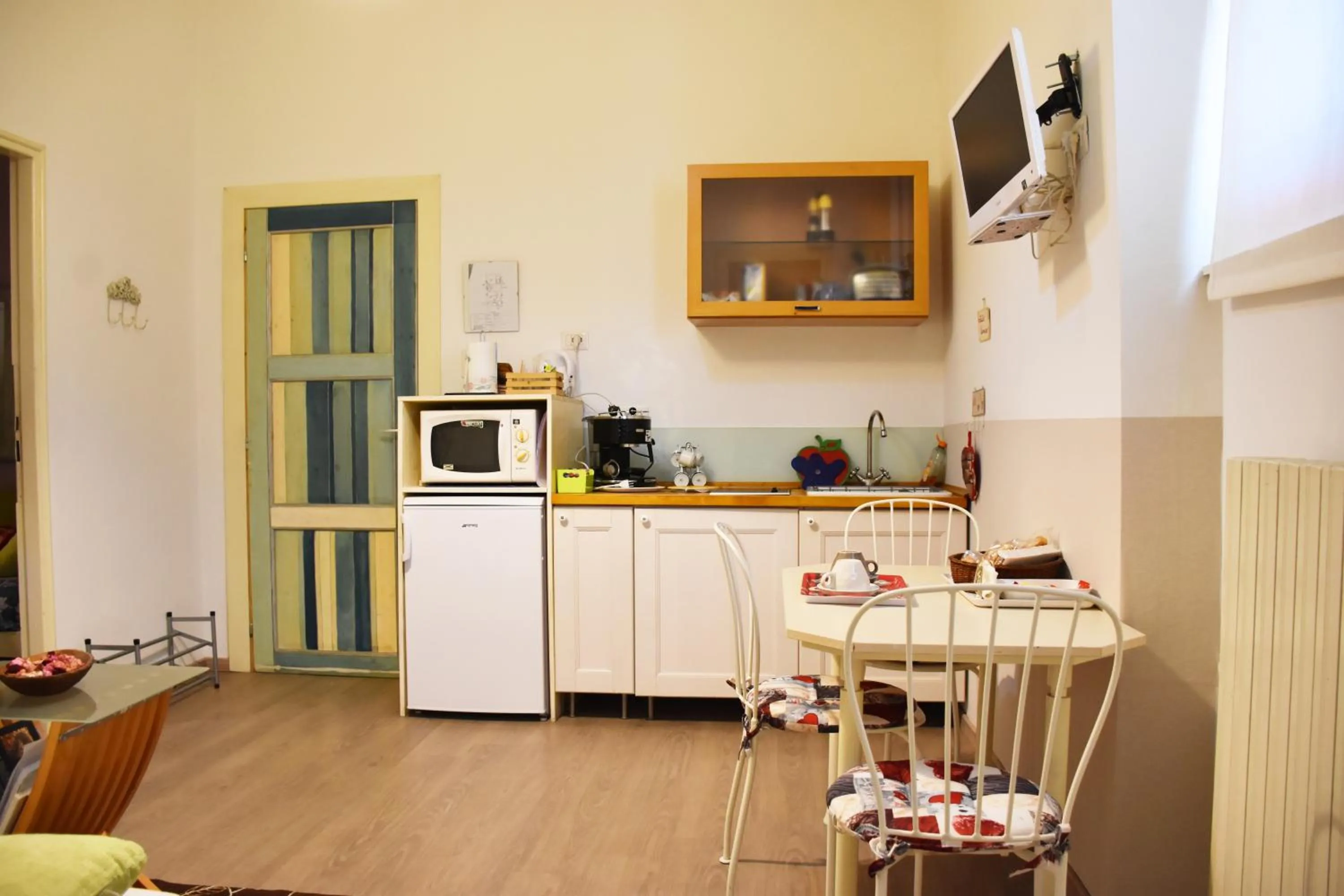 Kitchen or kitchenette in B&B via Roma