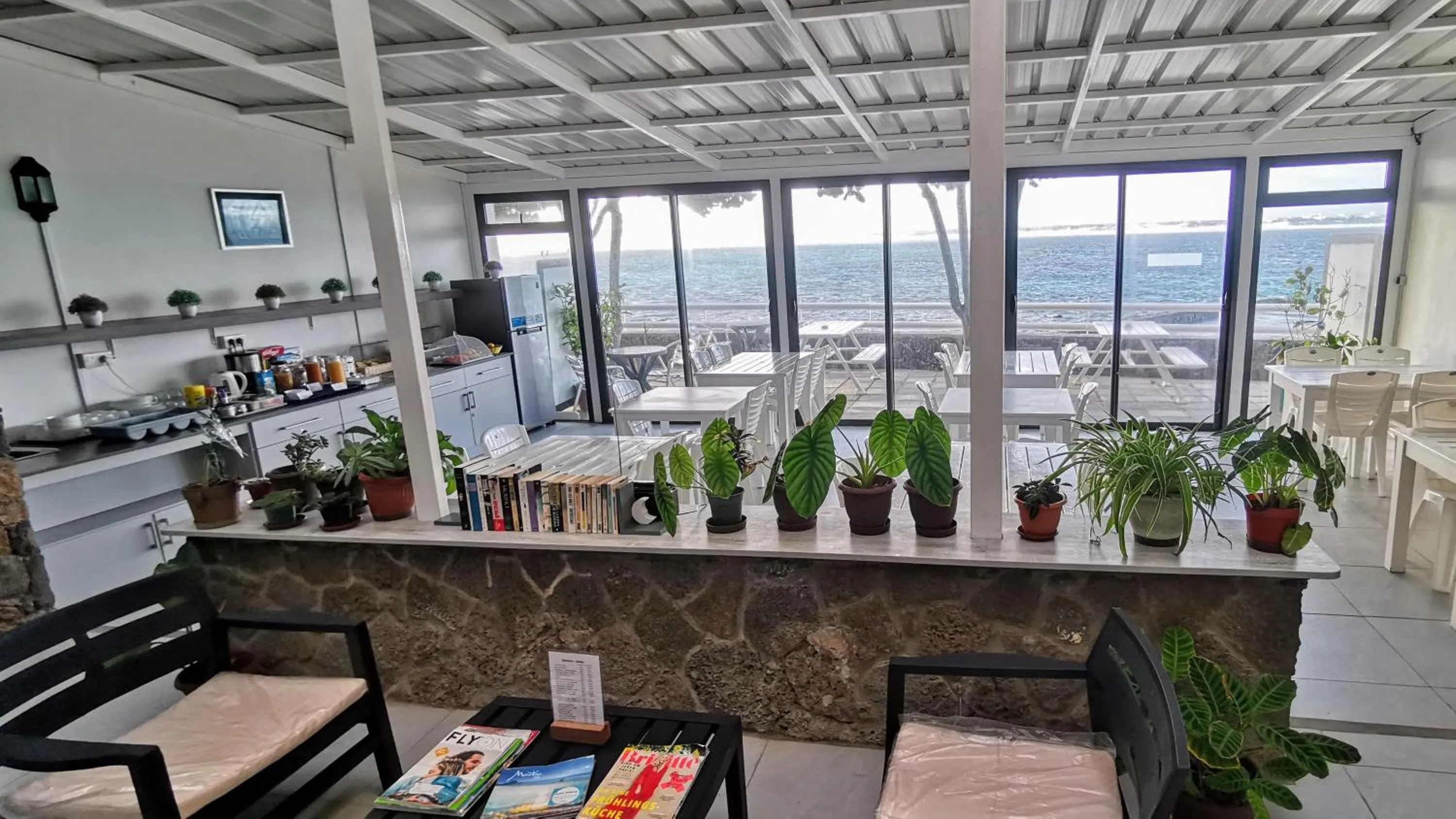 Communal lounge/ TV room in Blue Beryl Guest House