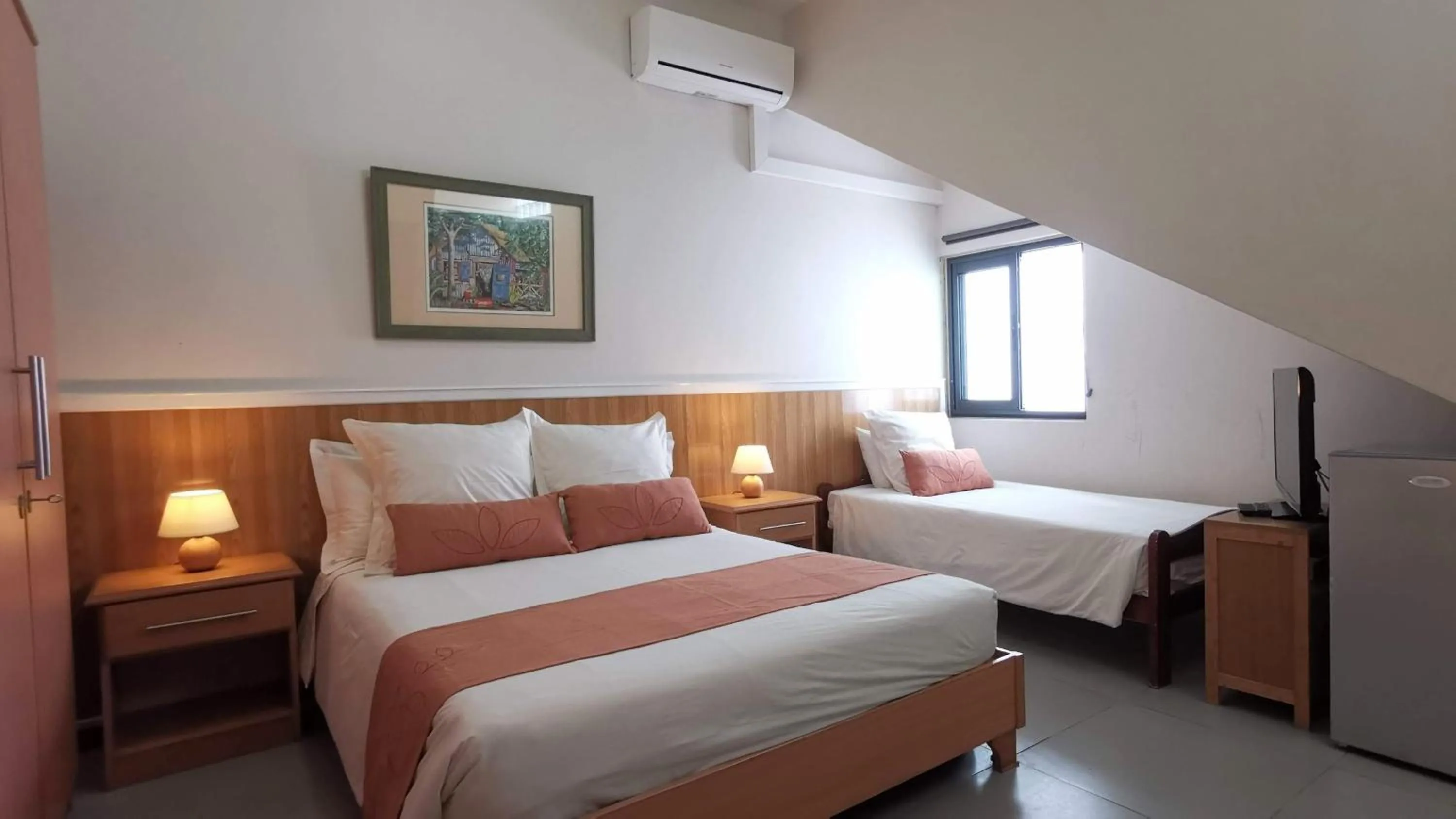 Bed in Blue Beryl Guest House