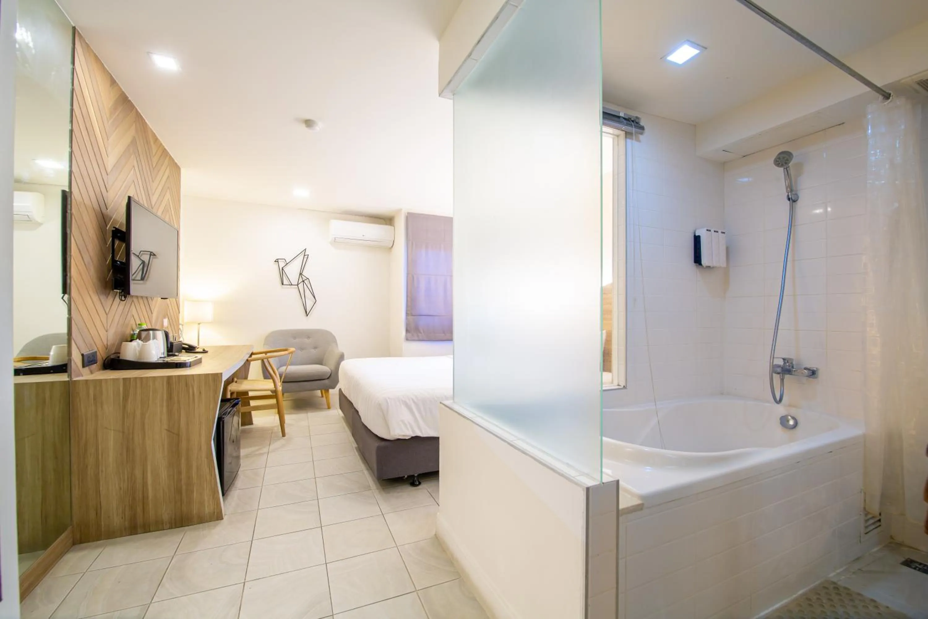 Bathroom, Bed in WE Terminal Hotel