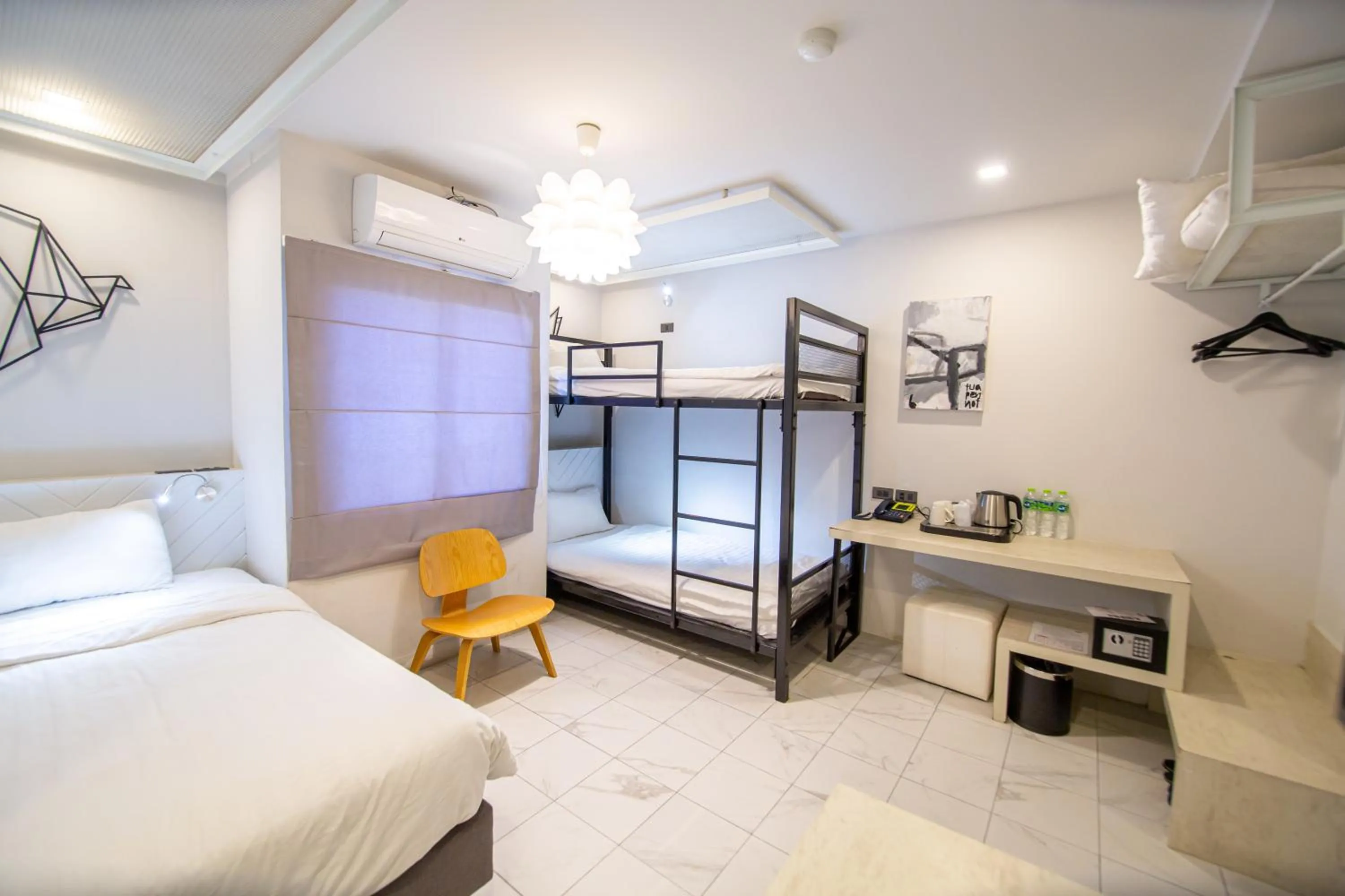 Photo of the whole room, Bed in WE Terminal Hotel