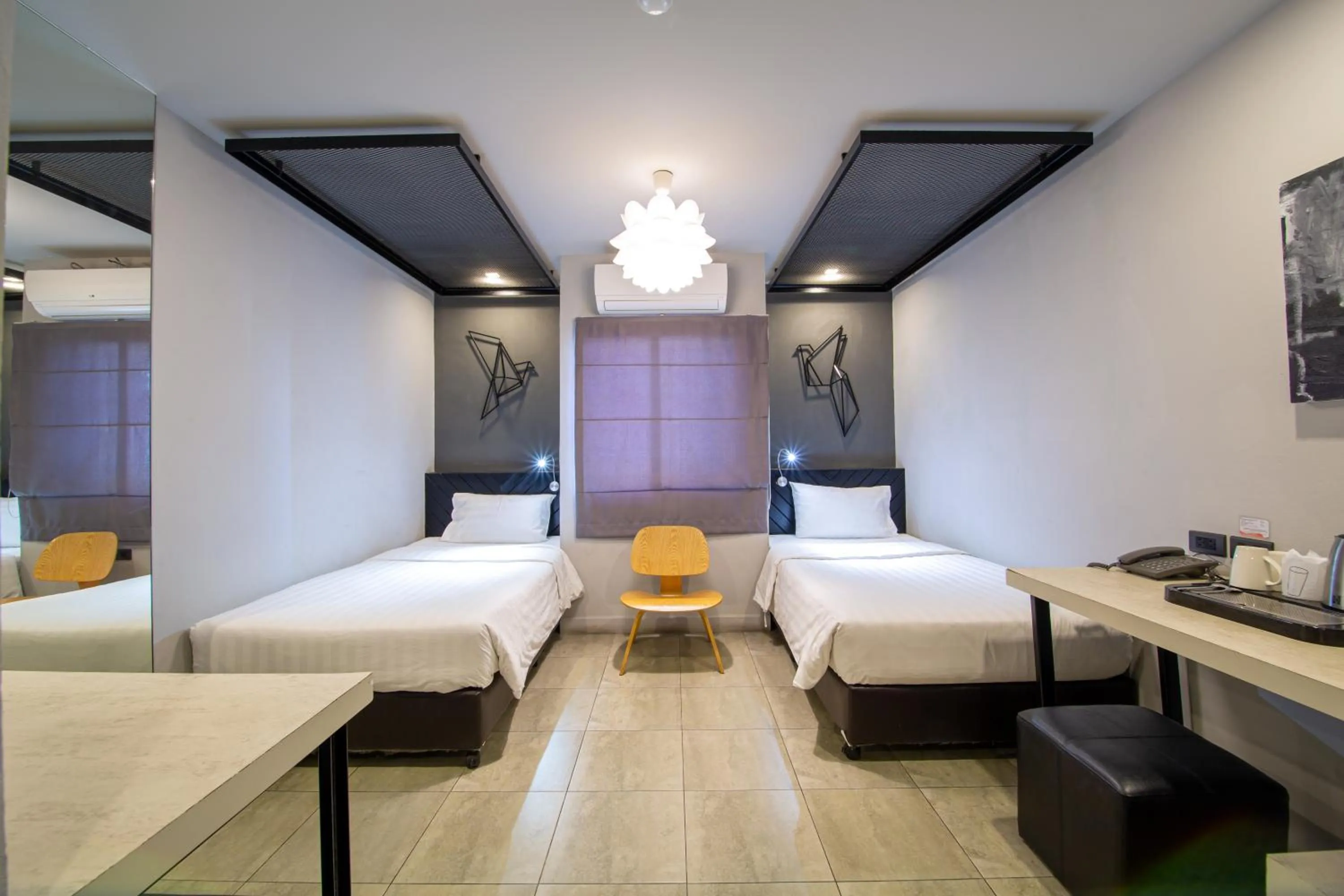 Photo of the whole room, Bed in WE Terminal Hotel