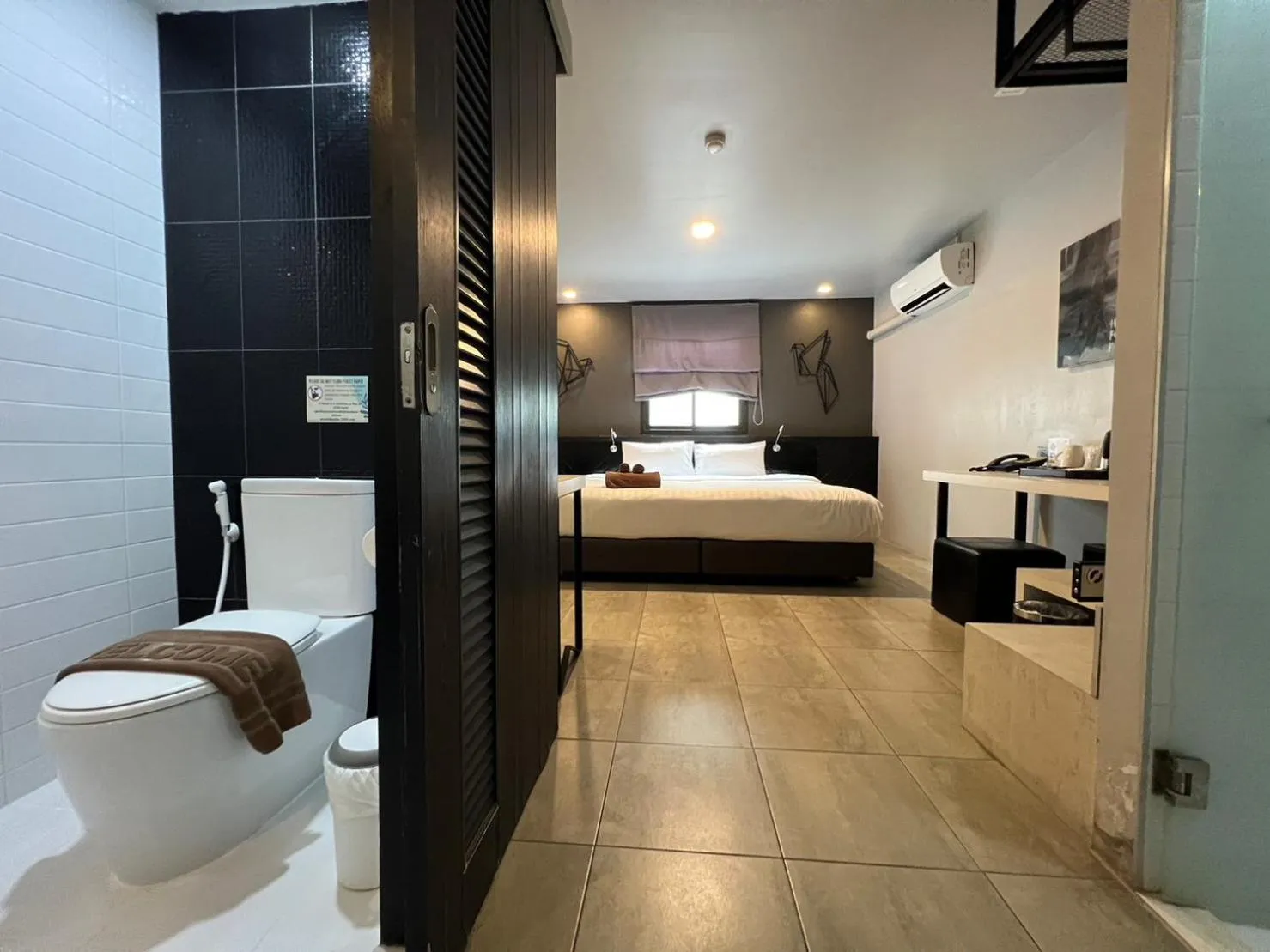 Toilet, Bed in WE Terminal Hotel